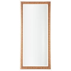 Grand miroir rectangulaire à encadrement doré