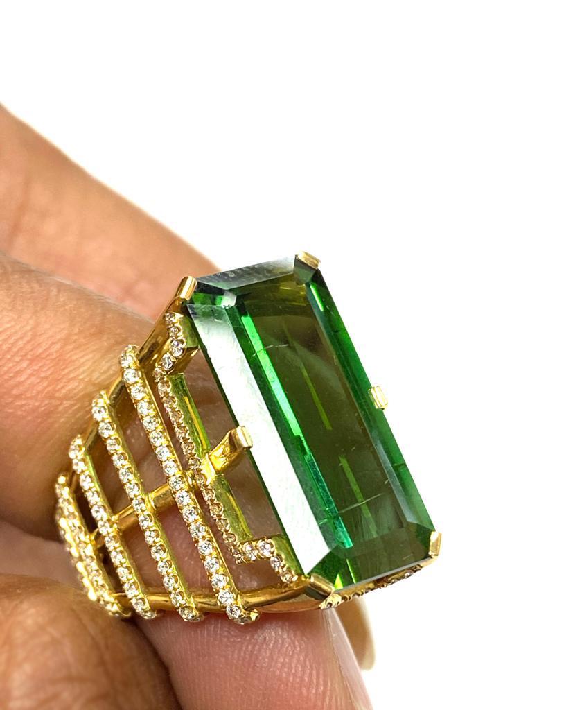Large Rectangular Green Tourmaline Ring With Diamonds  in 18K Yellow Gold, from 'G-One' Collection. This is a unique piece to add to your personal Collection!

* Gemstone size: 19.8 x 9.4 mm
* Gemstone: 100% Earth Mined 
* Approx. gemstone Weight: