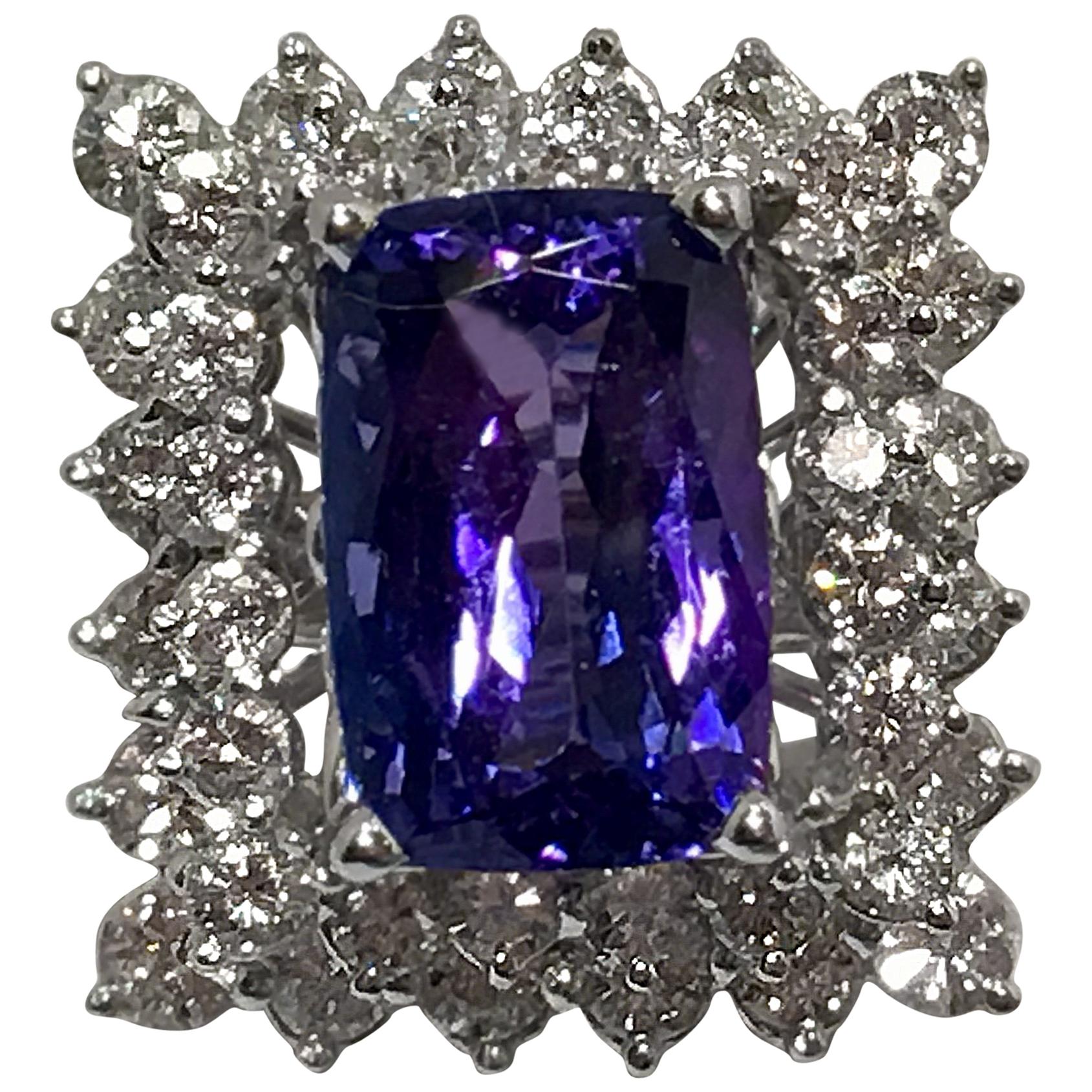 Showy 10.5 Carat Vivid Tanzanite Double Diamond Halo White Gold Cocktail Ring For Sale