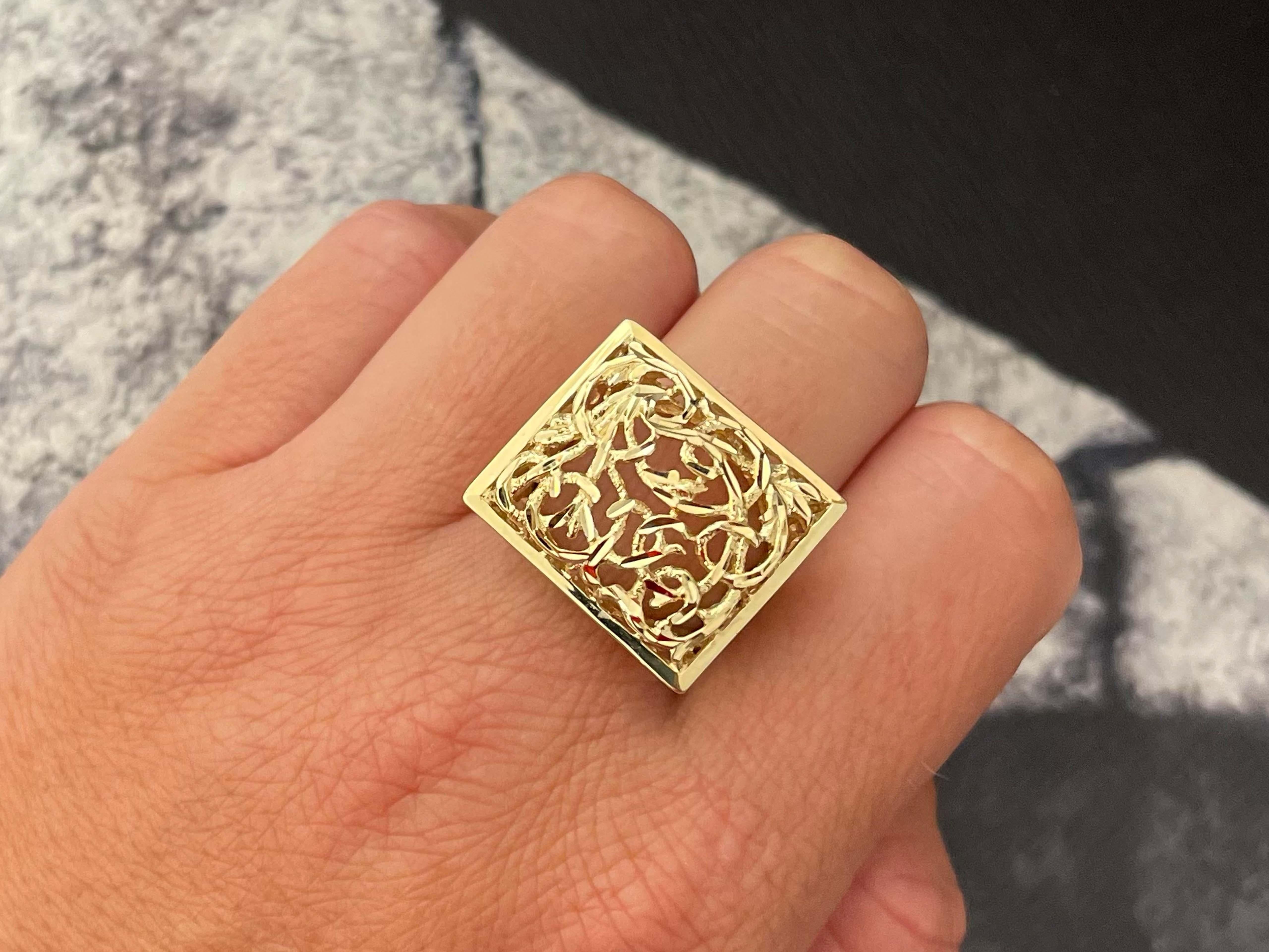 Ring Specifications:

Metal: 14K Yellow Gold

Ring Size: 7.25

Total Weight: 6.9 Grams 
​
​Ring Height: 19.6 mm
​
​Ring Width: 22.6 mm
​
​Stamped: 