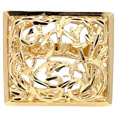 Grande bague rectangulaire à découpe en volute en or jaune 14 carats