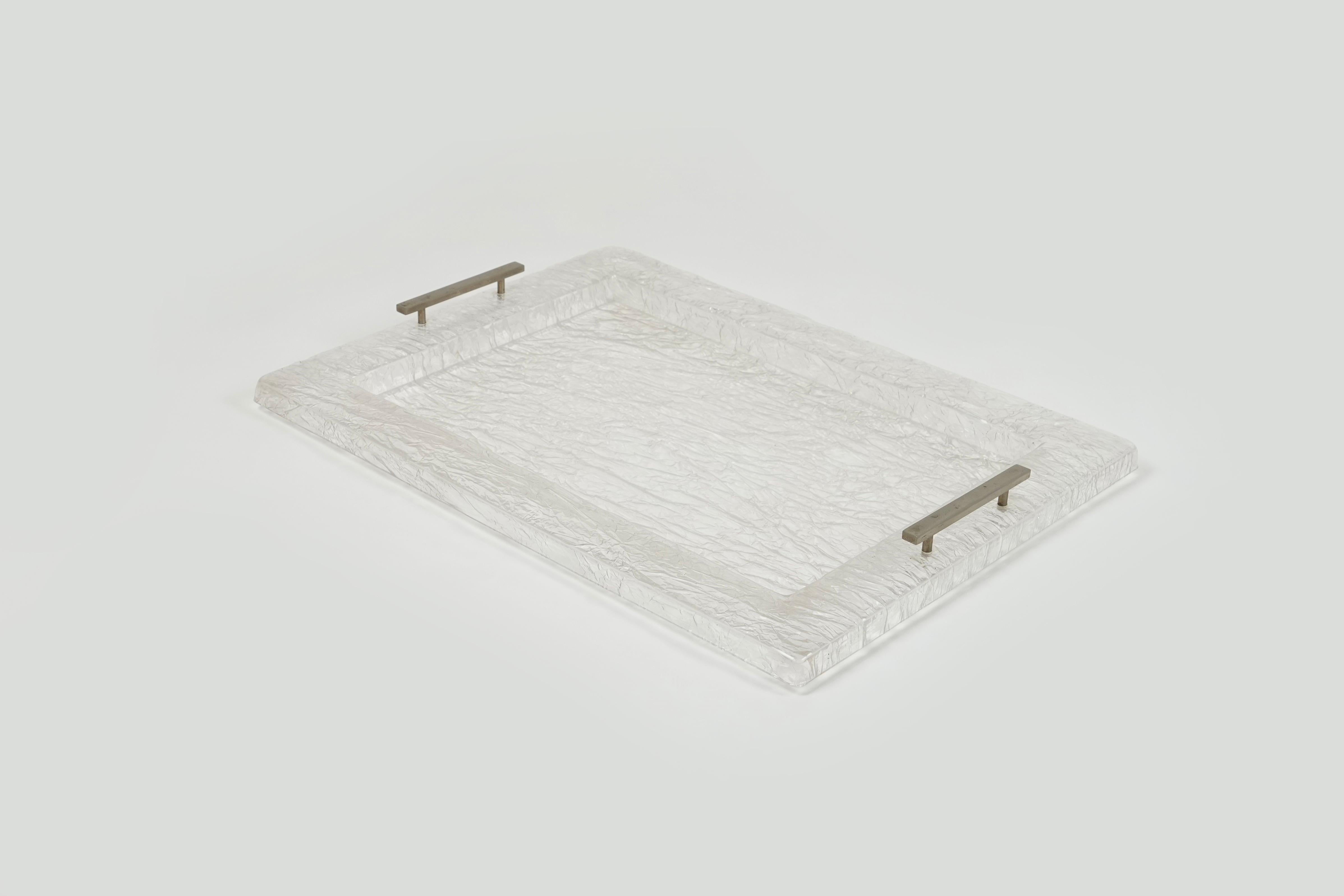 Amazing rectangular large serving tray in lucite ice effect whit metal handles in the style of Willy Rizzo.

Made in Italy in the 1980s.