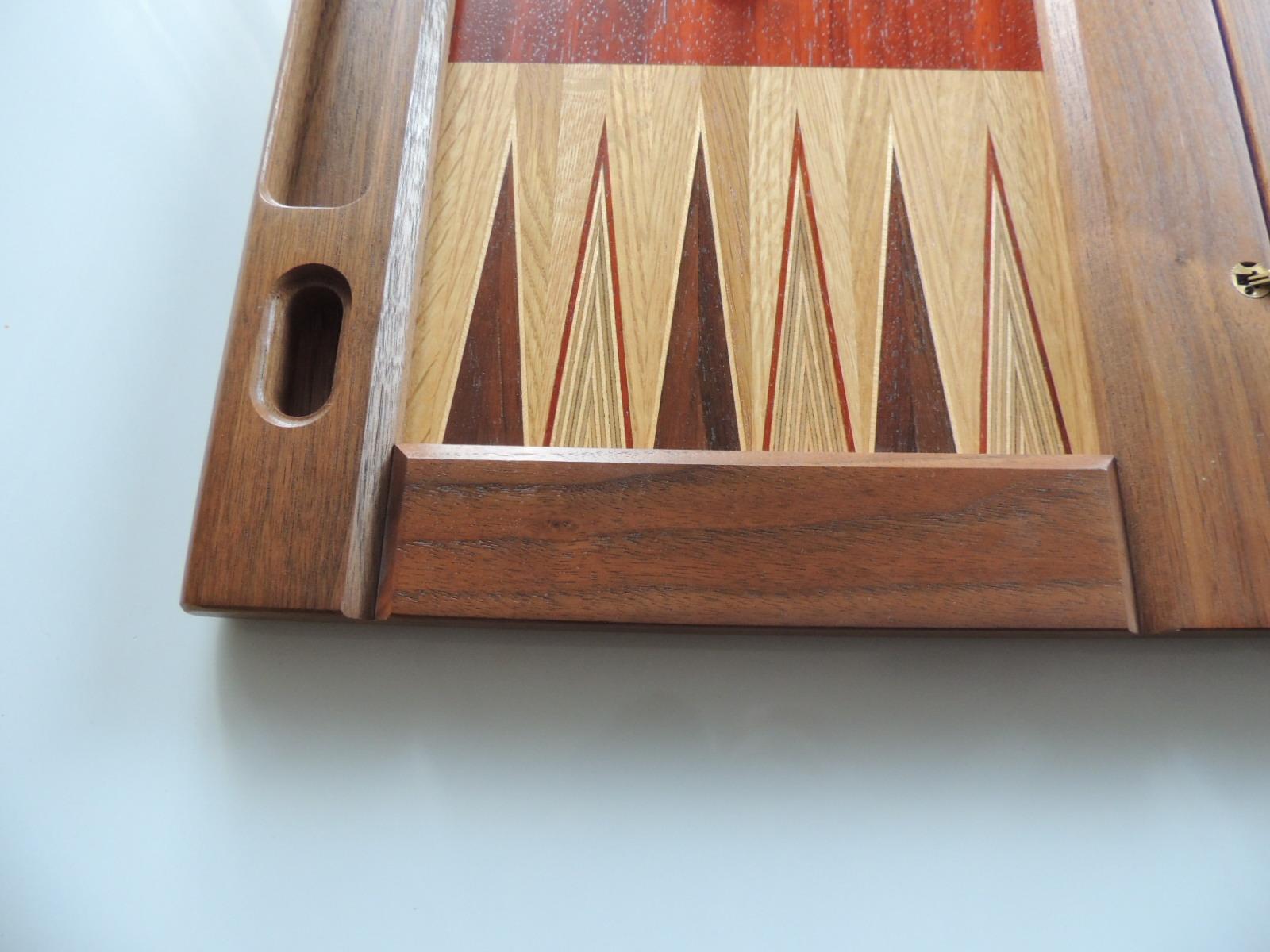 Large vintage style wood inlaid backgammon game board
with brass hinges. Folding game board.
Finished inlaid on both side.
