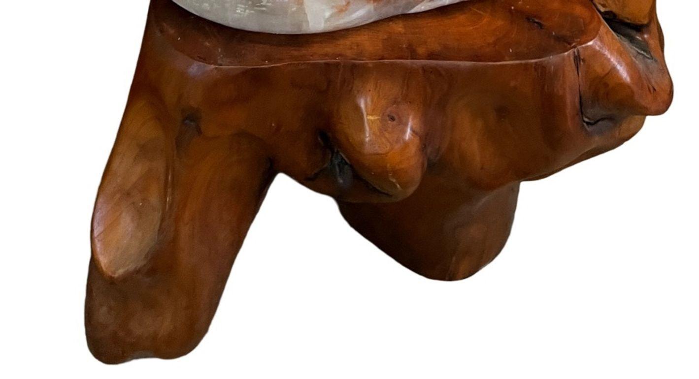 Large Red Calcite Stone on Wooden Base, Early 20th Century. Morocco. In Excellent Condition For Sale In Los Angeles, CA