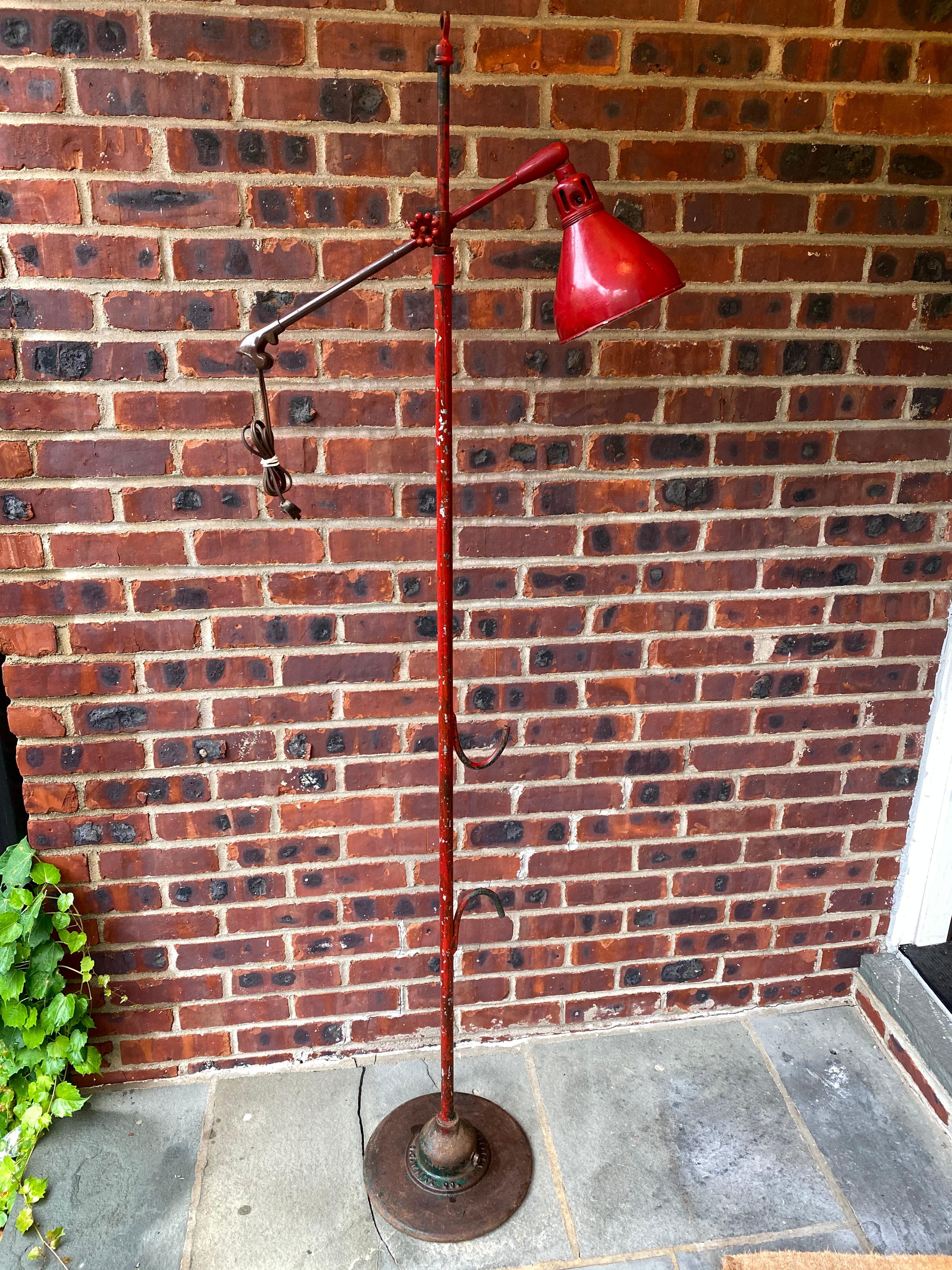 red metal floor lamp