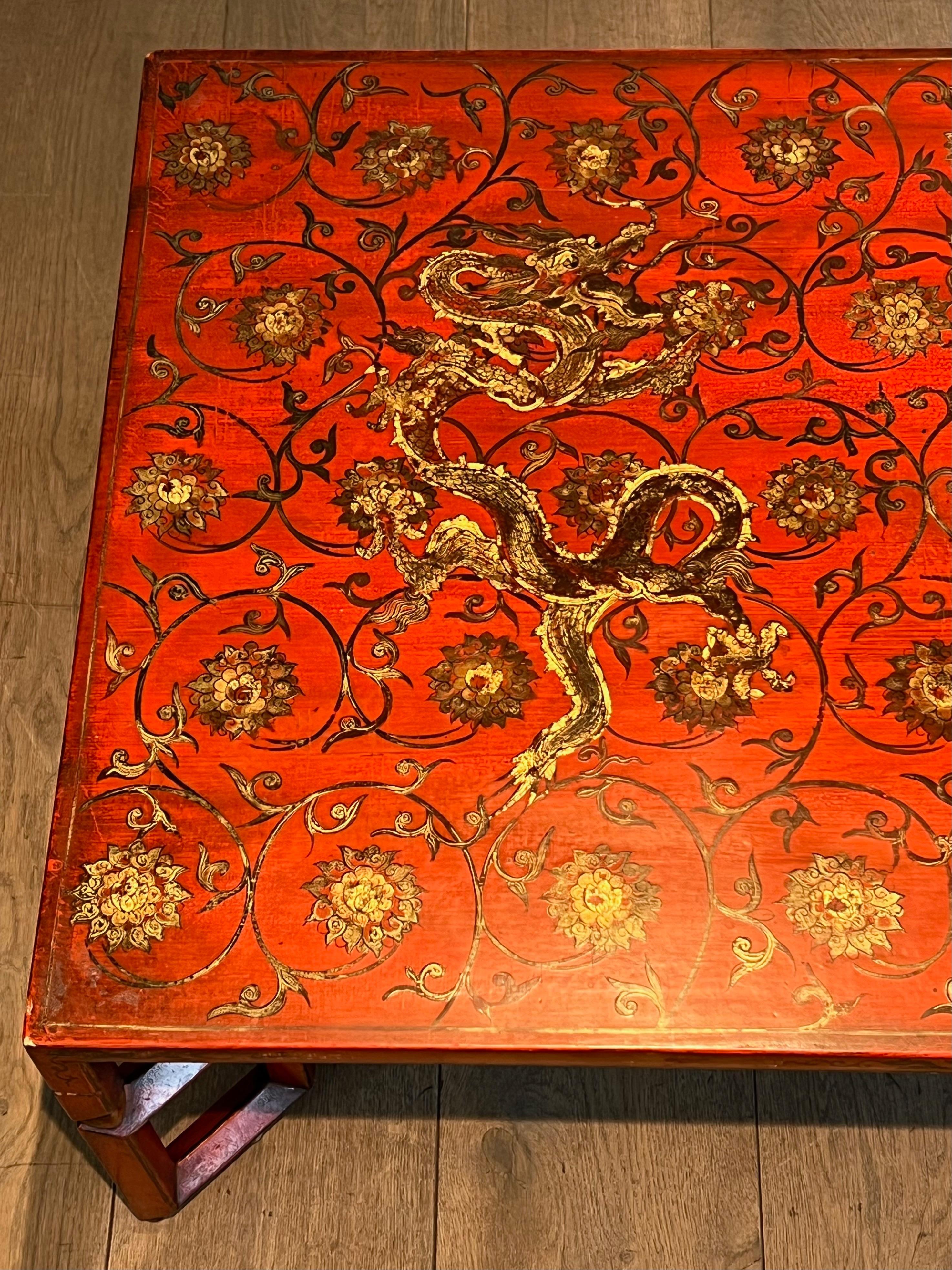 Mid-Century Modern Large Red Lacquered Coffee Table with Gold Chinese Decorations For Sale