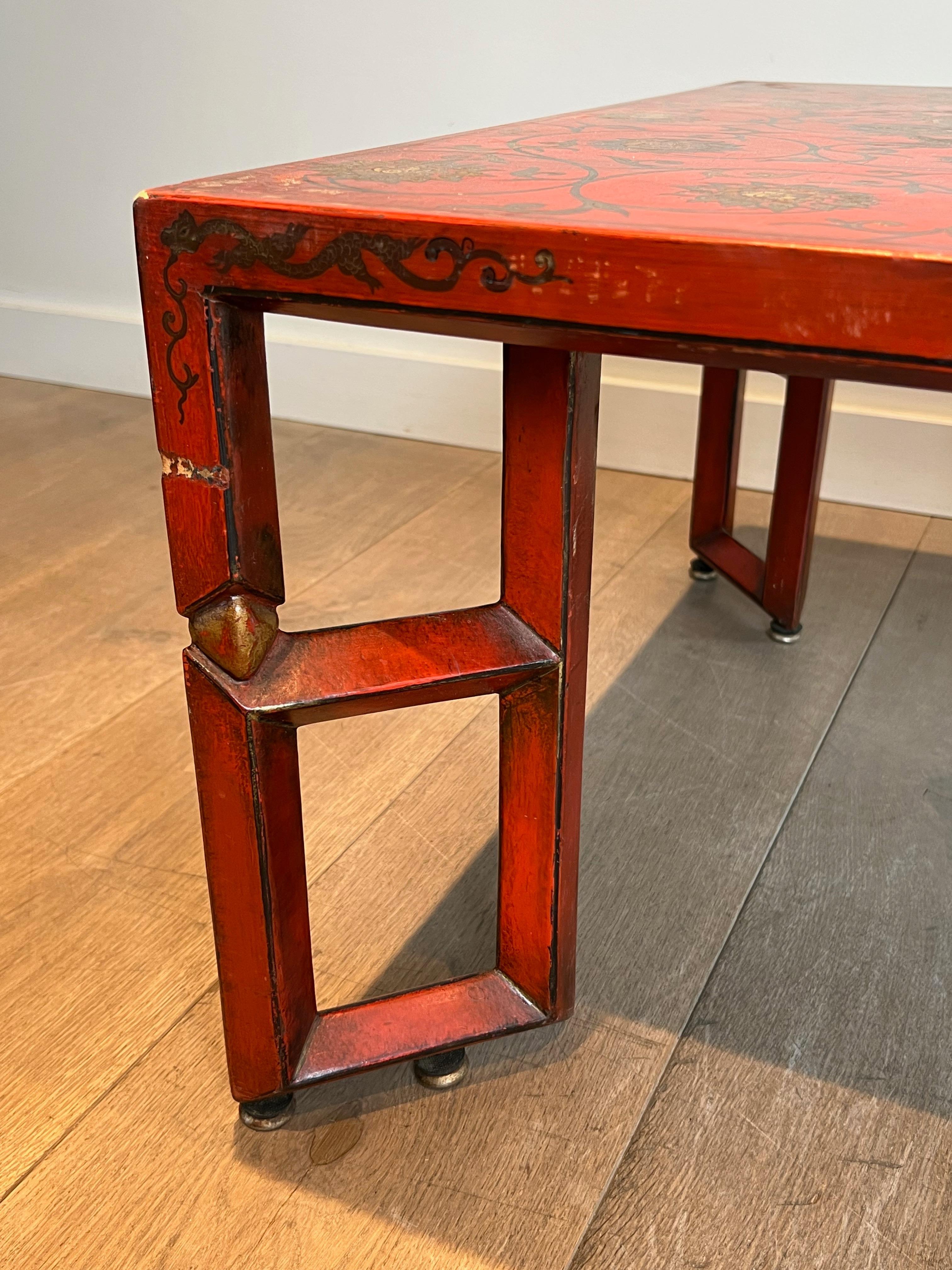 Gilt Large Red Lacquered Coffee Table with Gold Chinese Decorations For Sale