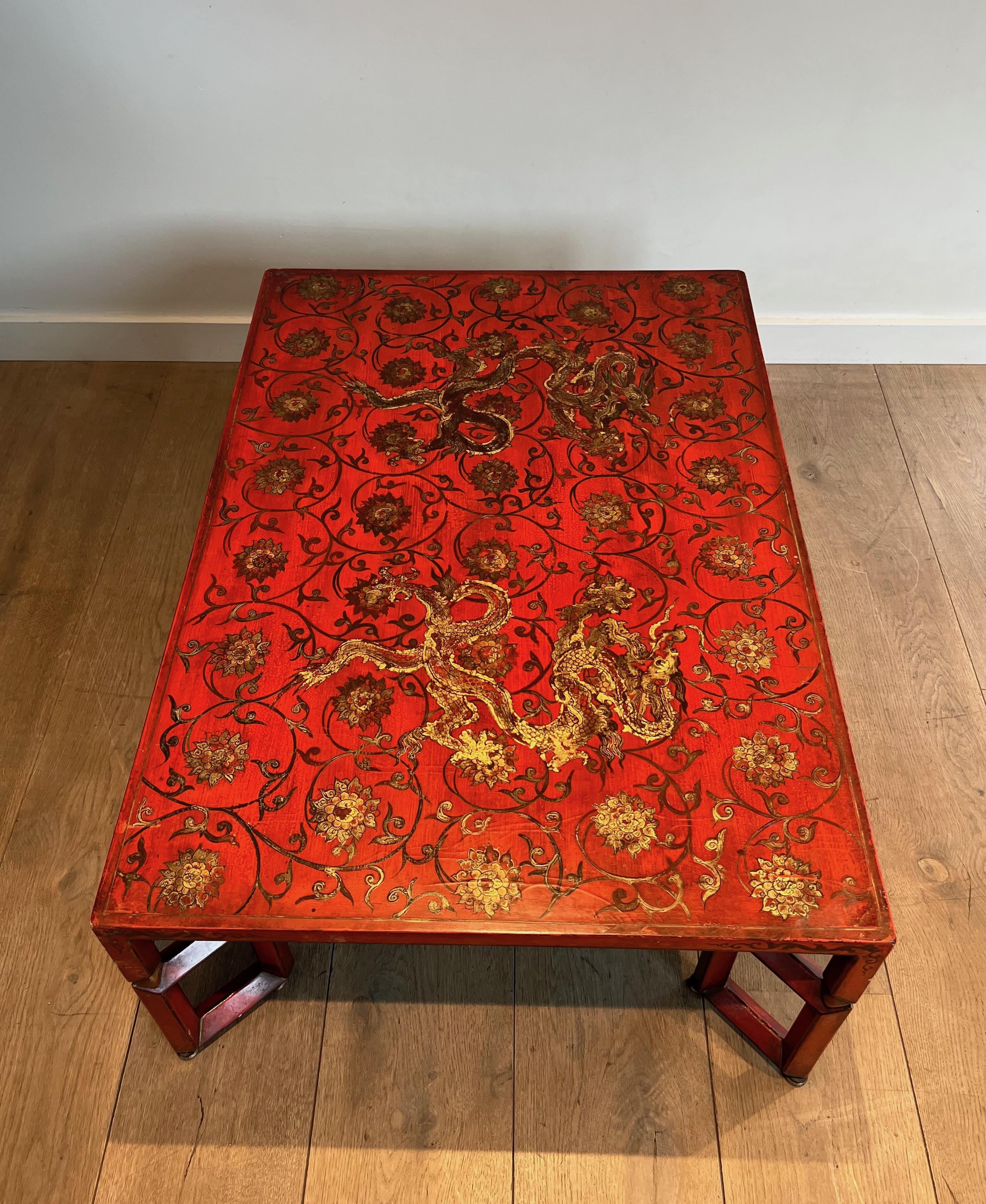 20th Century Large Red Lacquered Coffee Table with Gold Chinese Decorations For Sale