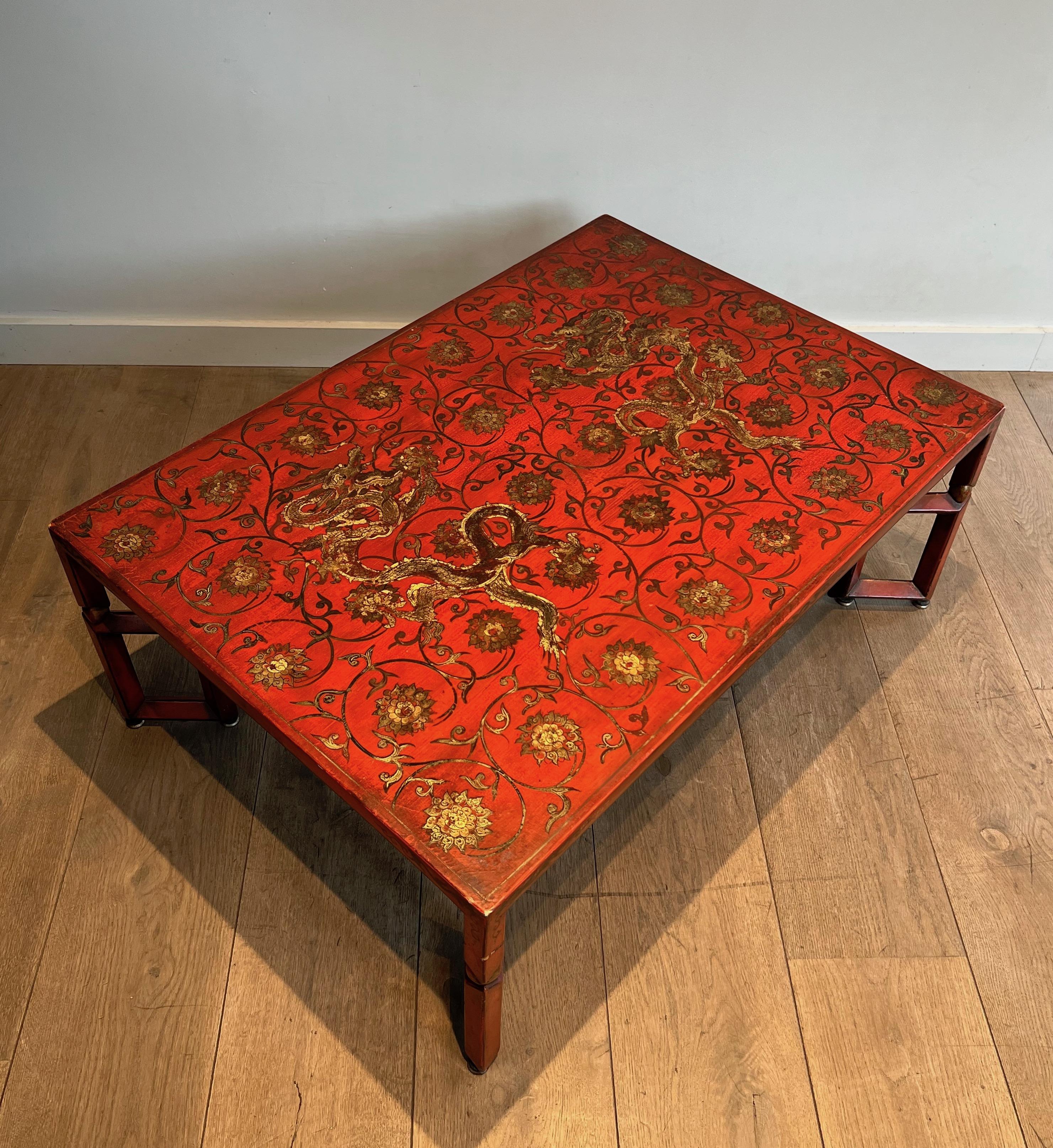 Wood Large Red Lacquered Coffee Table with Gold Chinese Decorations For Sale
