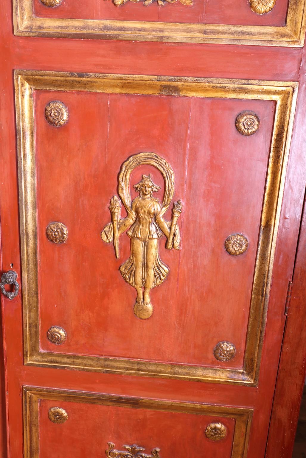 English Large Red Lacquered wardrobe with gilded figures in relief For Sale