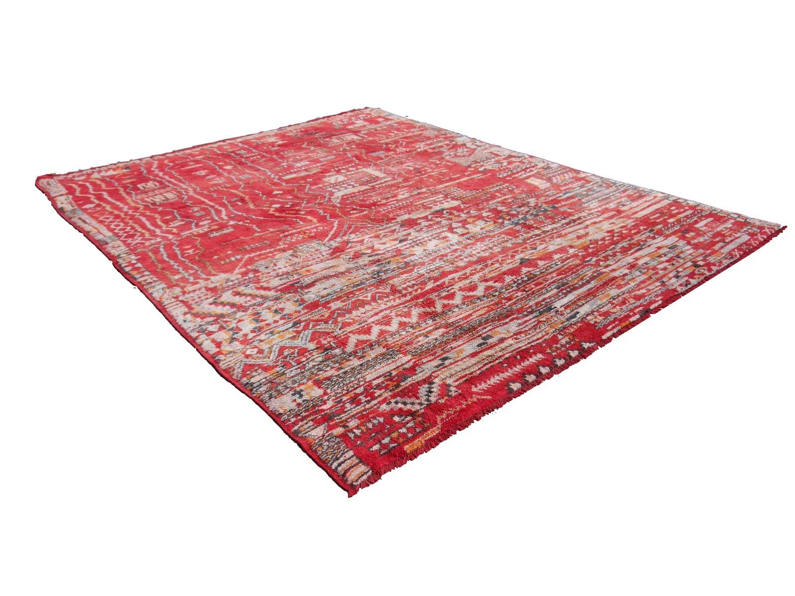 Large red Moroccan Amazigh vintage rug North African tribal design - Djoharian Collection 

Berber rugs and carpets are mainly made in Morocco, Tunesia and Algeria. Largest producer are the tribal and nomadic Berber people of Morocco. Different