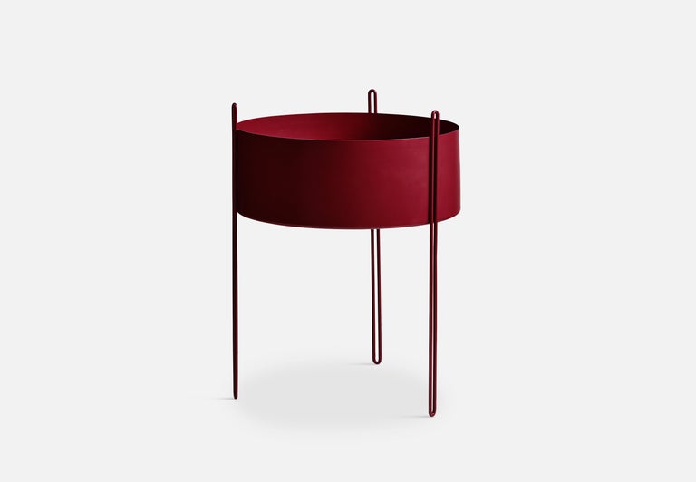 Large red pidestall planter by Emilie Stahl Carlsen
Materials: Metal.
Dimensions: D 40 x H 55 cm
Available in grey, red, taupe or black and in 3 sizes: D 15 x H 15, D 40 x H 35, D 40 x H 55 cm.

Emilie Stahl Carlsen is a Nor wegian designer who