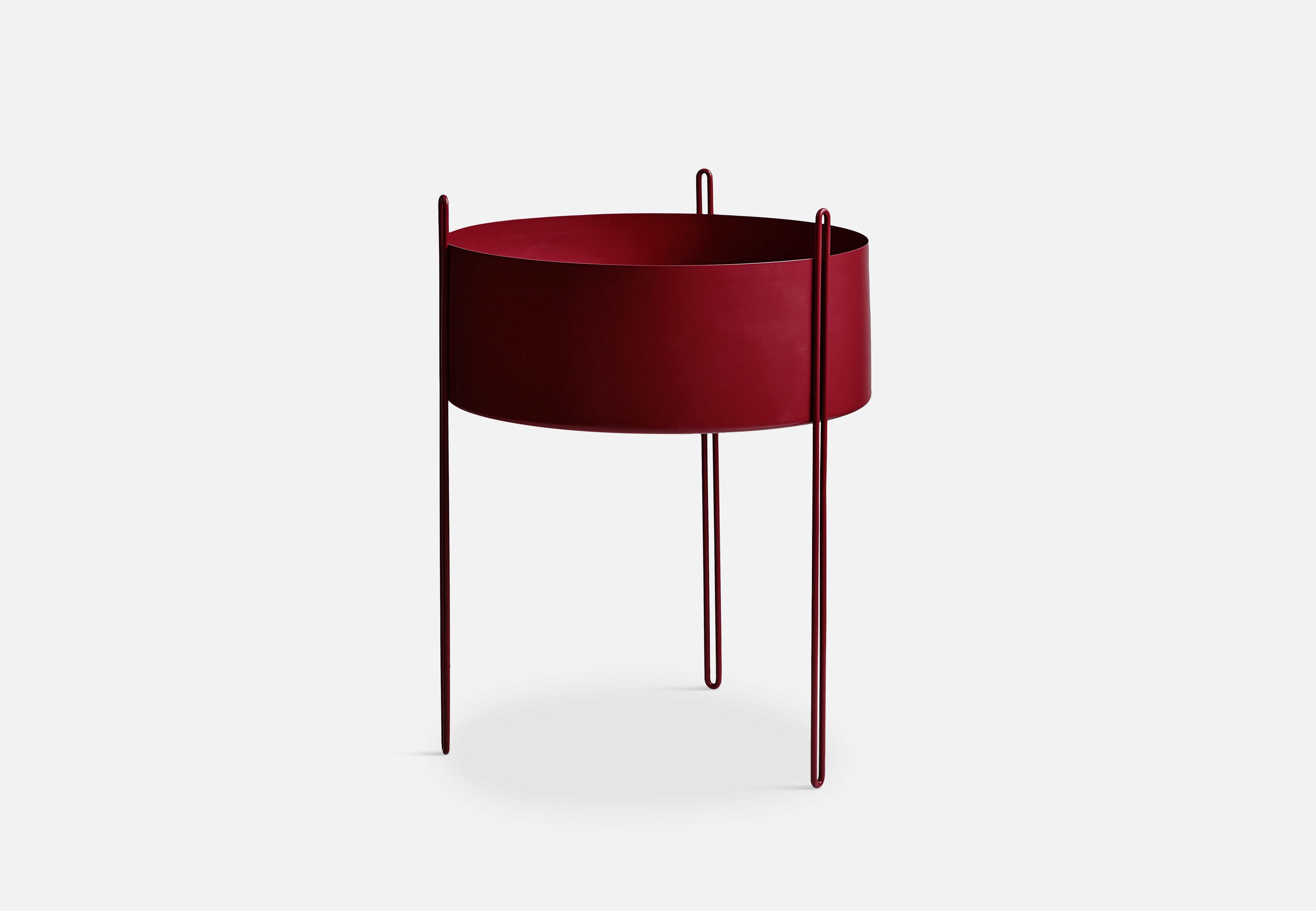 Large red pidestall planter by Emilie Stahl Carlsen.
Materials: metal.
Dimensions: D 40 x H 55 cm.
Available in grey, red, taupe or black and in 3 sizes: D 15 x H 15, D 40 x H 35, D 40 x H 55 cm.

Emilie Stahl Carlsen is a Nor wegian designer
