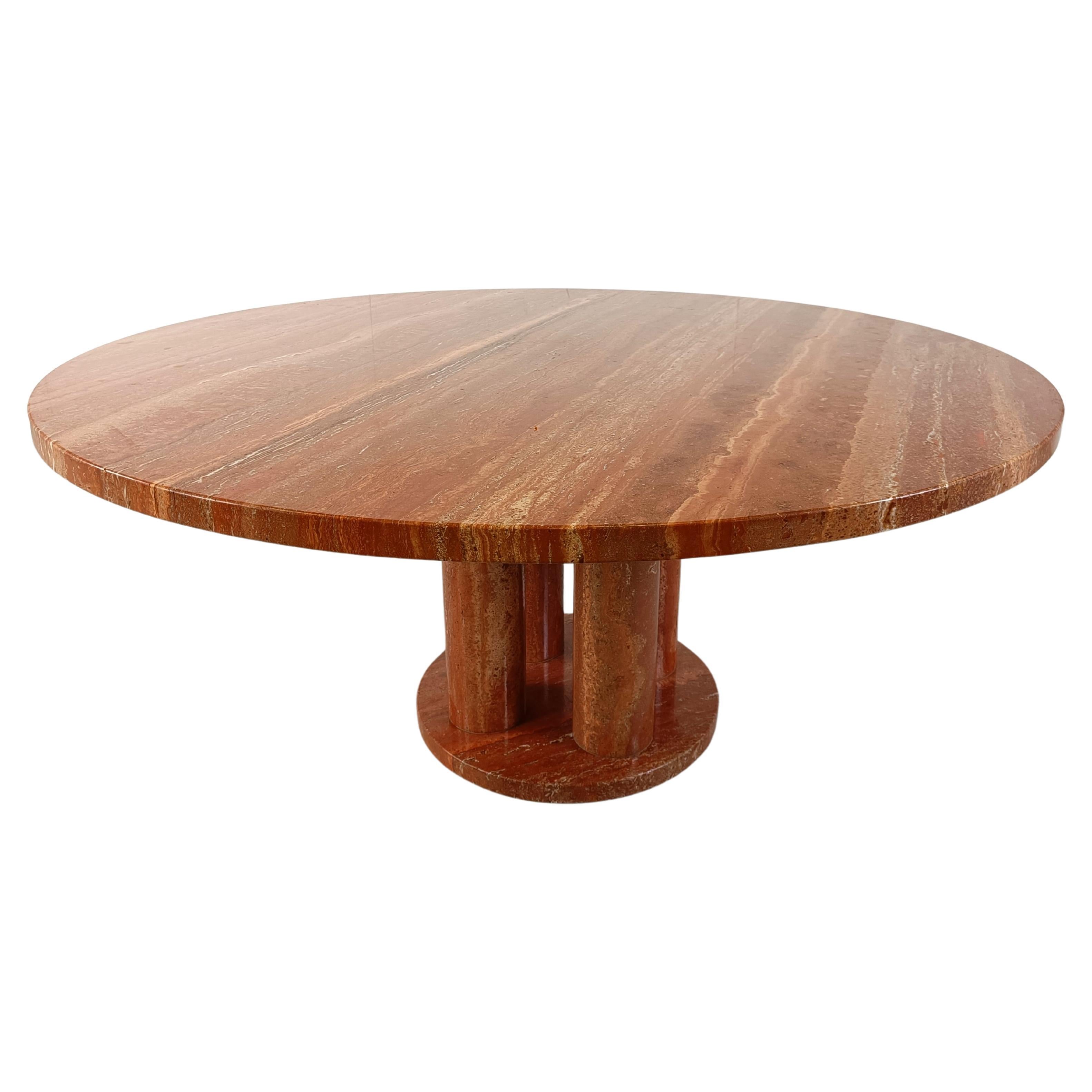 Large red travertine round dining table, 1970s For Sale