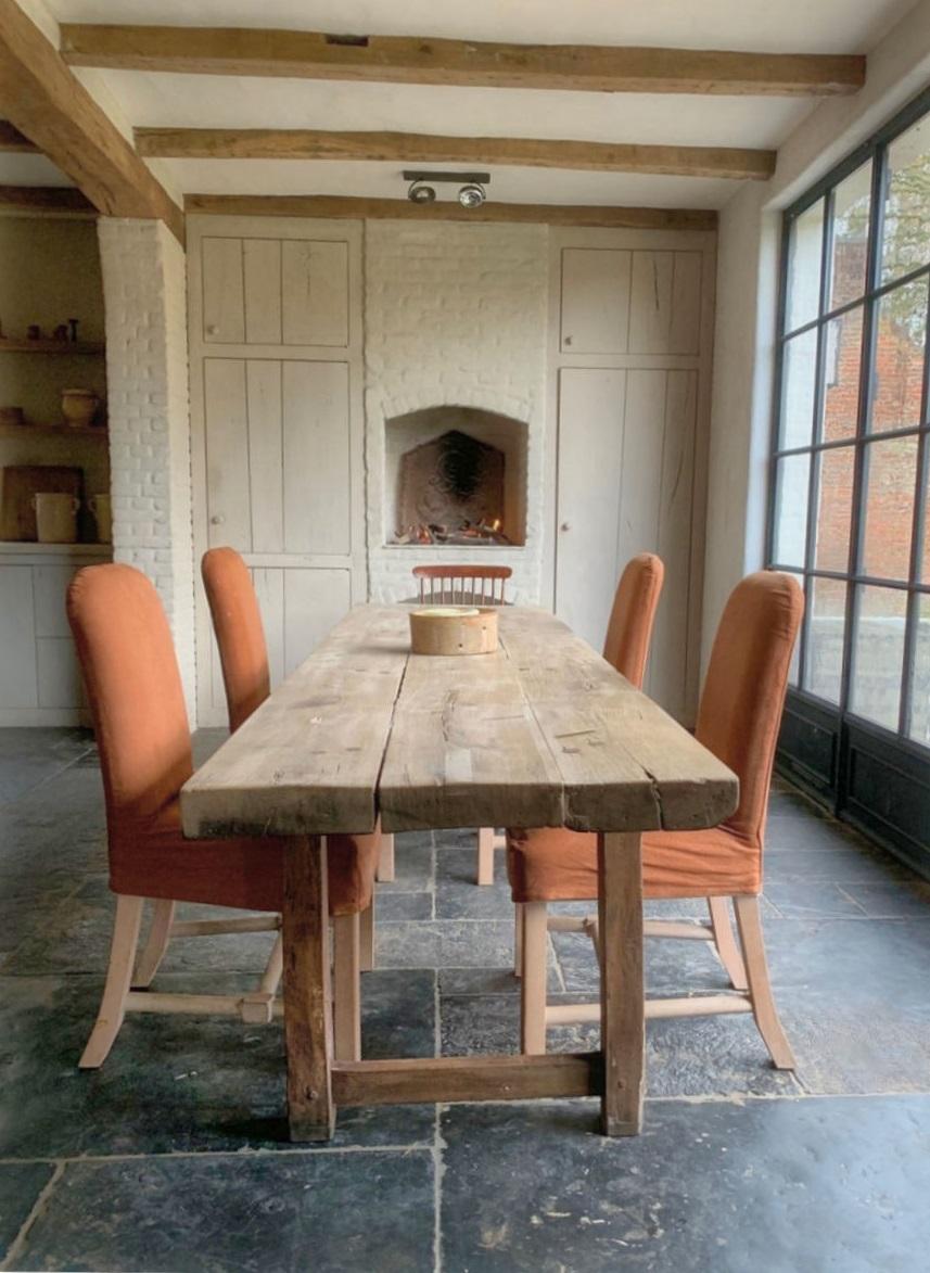 A large 19th century French refectory table. Probably made in the Northwest region of France by local craftsmen for a farmhouse. Great proportions, verry sturdy and subtle patina. The top in ash and the feet in oak.