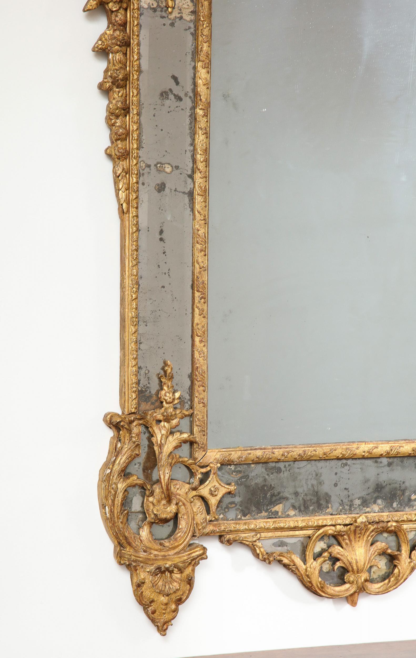 Large Régence Carved Giltwood Wall Mirror For Sale 4
