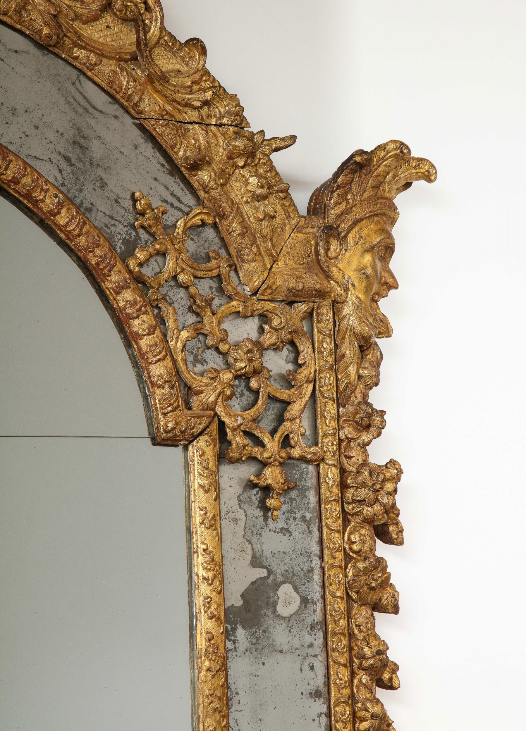 Large Régence Carved Giltwood Wall Mirror In Fair Condition For Sale In Greenwich, CT