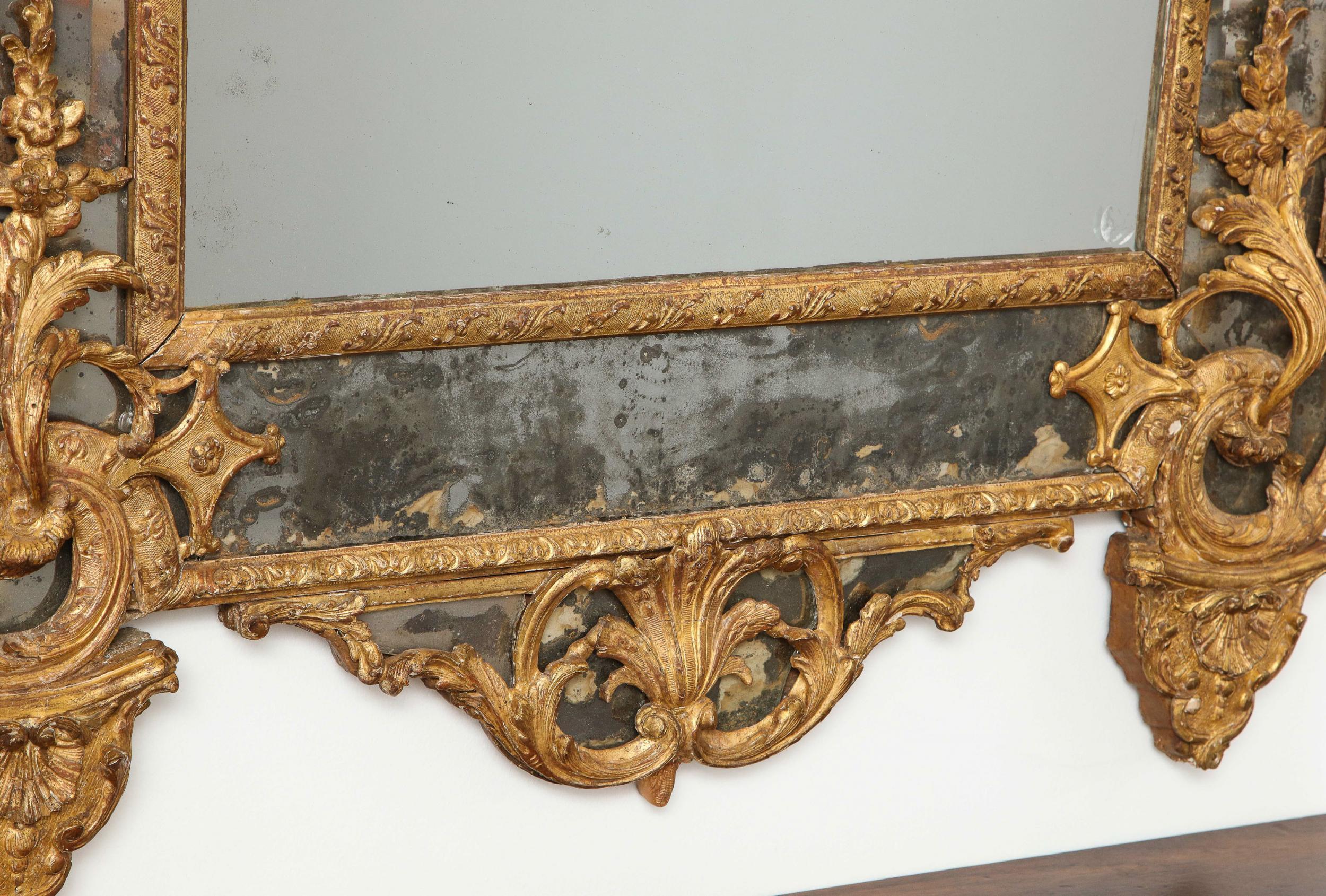 Large Régence Carved Giltwood Wall Mirror For Sale 1