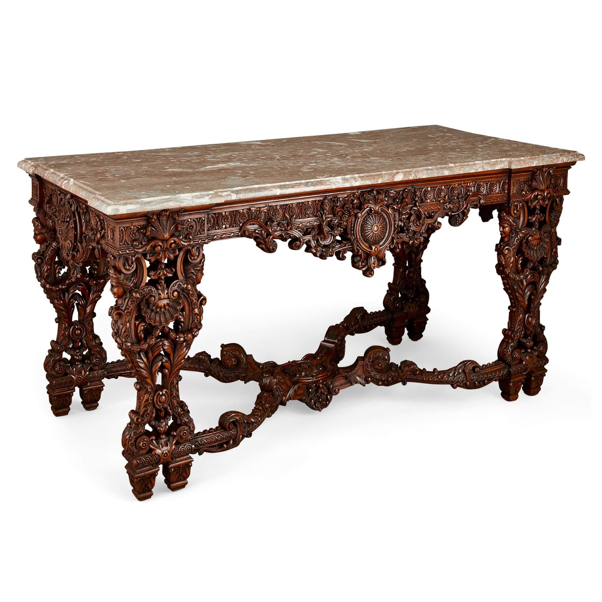 Large Regence Style Mahogany Centre Table with Marble Top
French, Late 19th Century
Height 82cm, width 176cm, depth 81cm

With an exceptionally intricate and ornate carved mahogany structure, this beautiful table, topped with grey and pink marble,