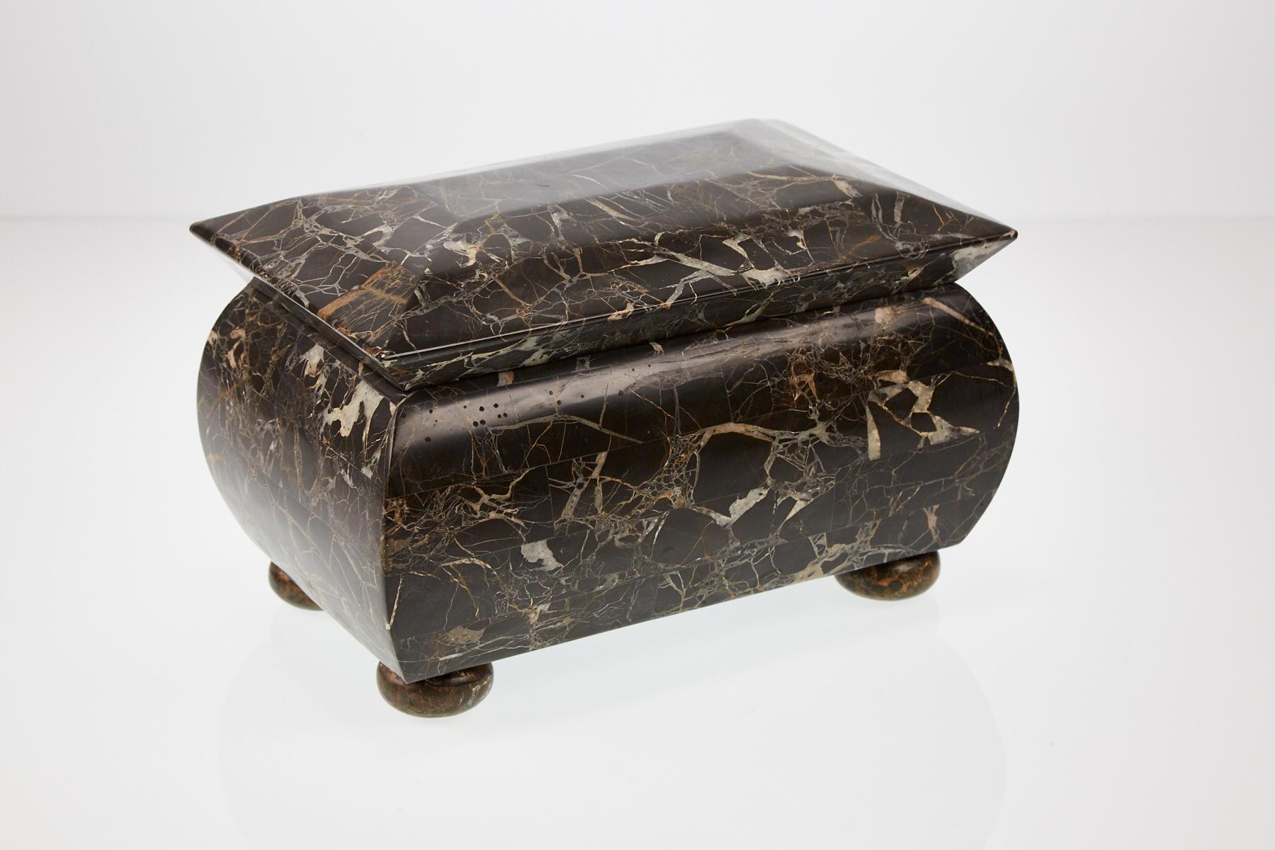 Large hinged box with smooth tessellated snakeskin stone along exterior and wood-lined interior. Perfect tea caddy or decorative trinket box.

All furnishings are made from 100% natural Fossil Stone or Seashell inlay, carefully hand cut and crafted