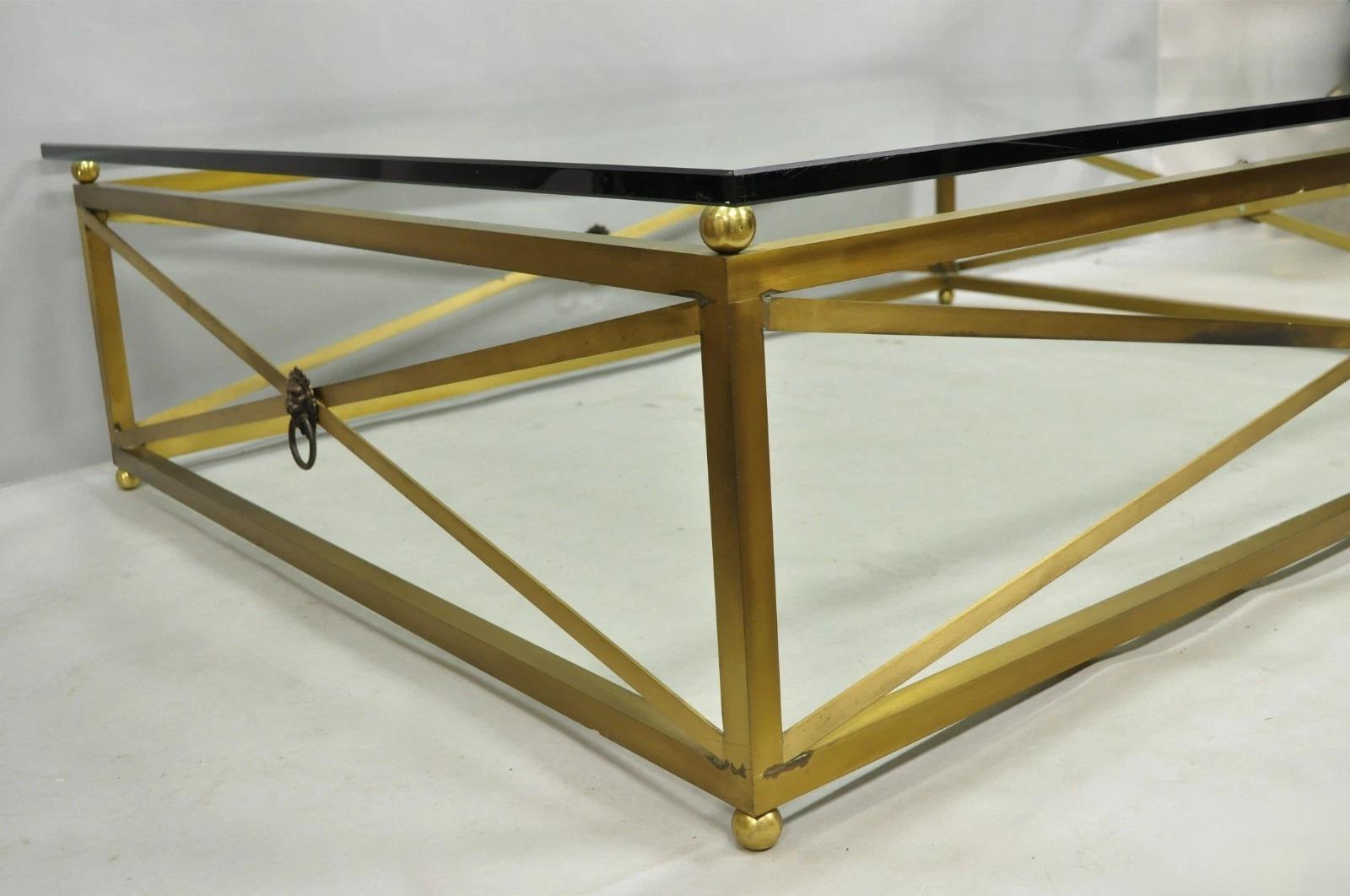 Large Regency Style Burnished Brass Rectangular Glass Top Coffee Table w/ Lions In Good Condition For Sale In Philadelphia, PA