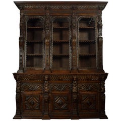 Large Renaissance Revival Carved Oak Three-Door Bookcase