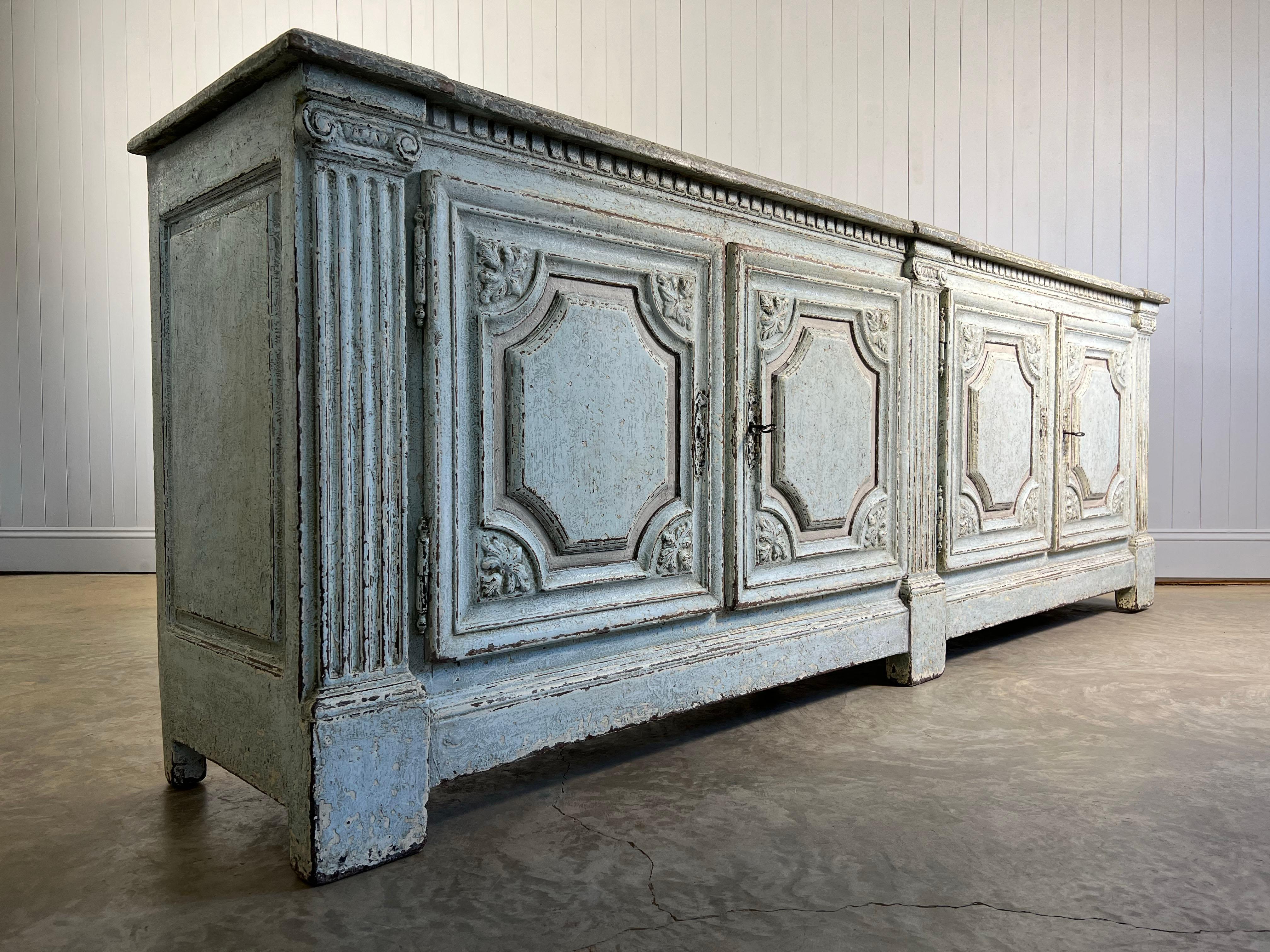 This stunning oak sideboard is mid 19th Century, the style is Louis XVI - the paint is new.  

Wonderful details throughout and having been fully restored - everything works as it should, complete with keys and restored locks.  Some new components