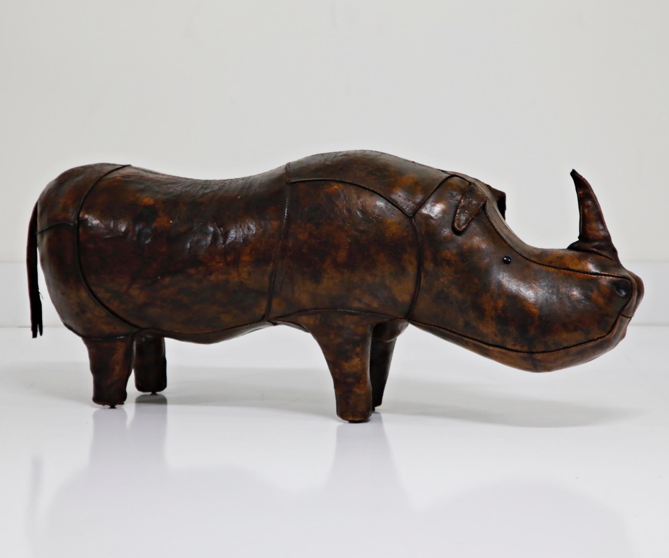 A wonderful example of the large version rhinoceros by Dimitri Omersa for Abercrombie and Fitch, circa 1950s. This example is signed with the Made in England label, and is in beautiful lightly distressed condition with light craquelure throughout.
