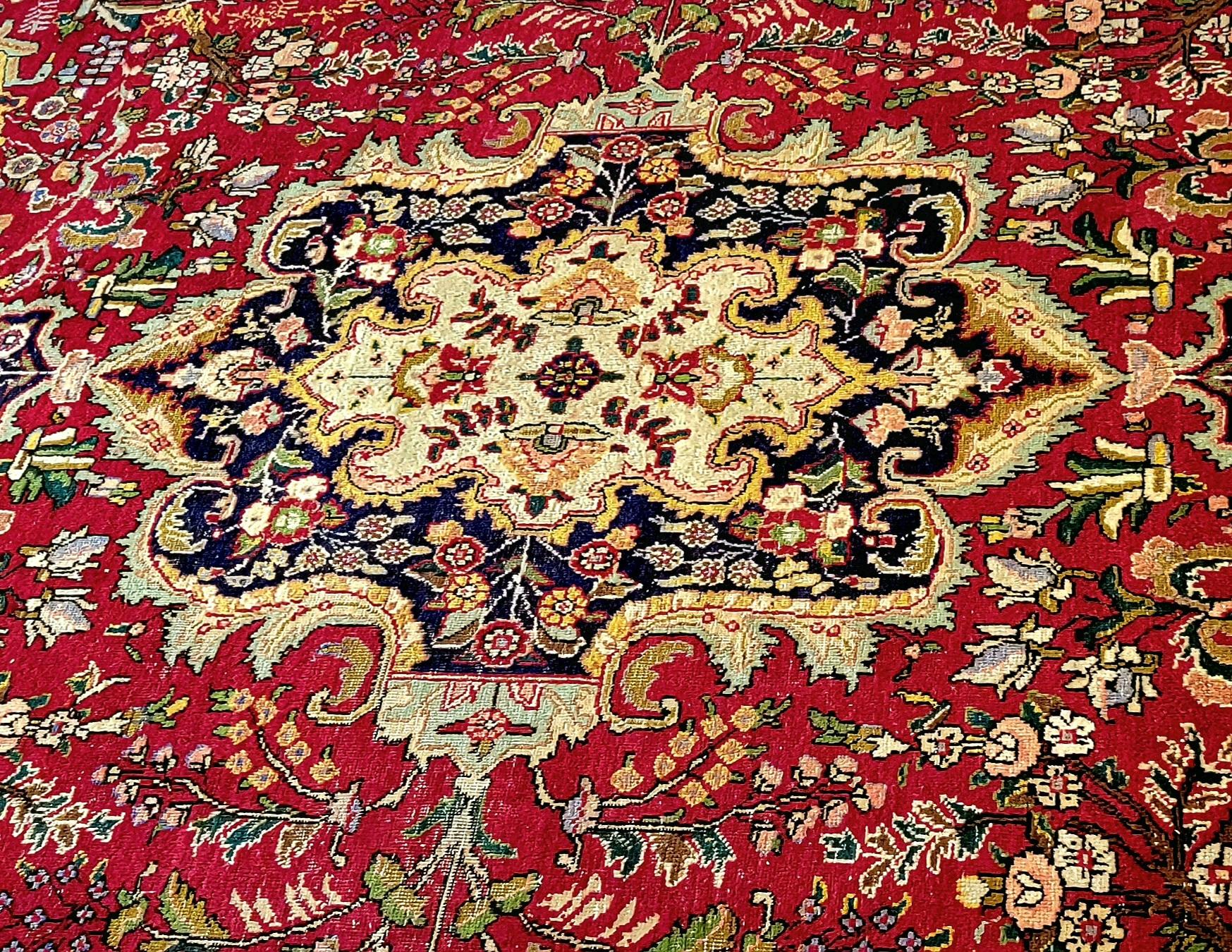 Richly colored and sumptuous in texture Persian rug.