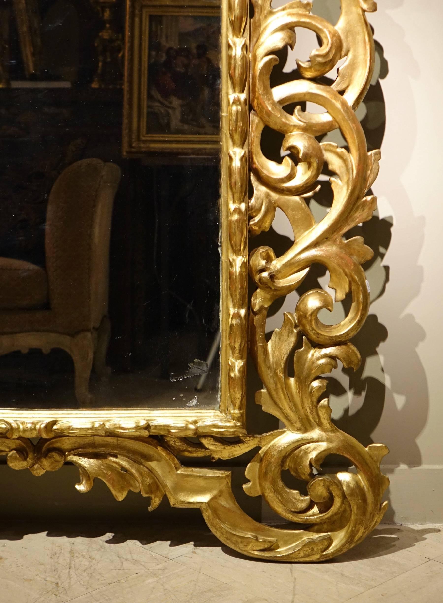 Italian Large Richly Carved Giltwood Mirror, Italy, 18th Century