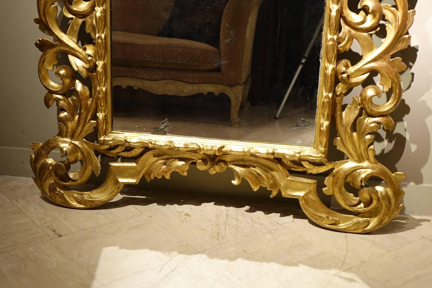 Hand-Carved Large Richly Carved Giltwood Mirror, Italy, 18th Century