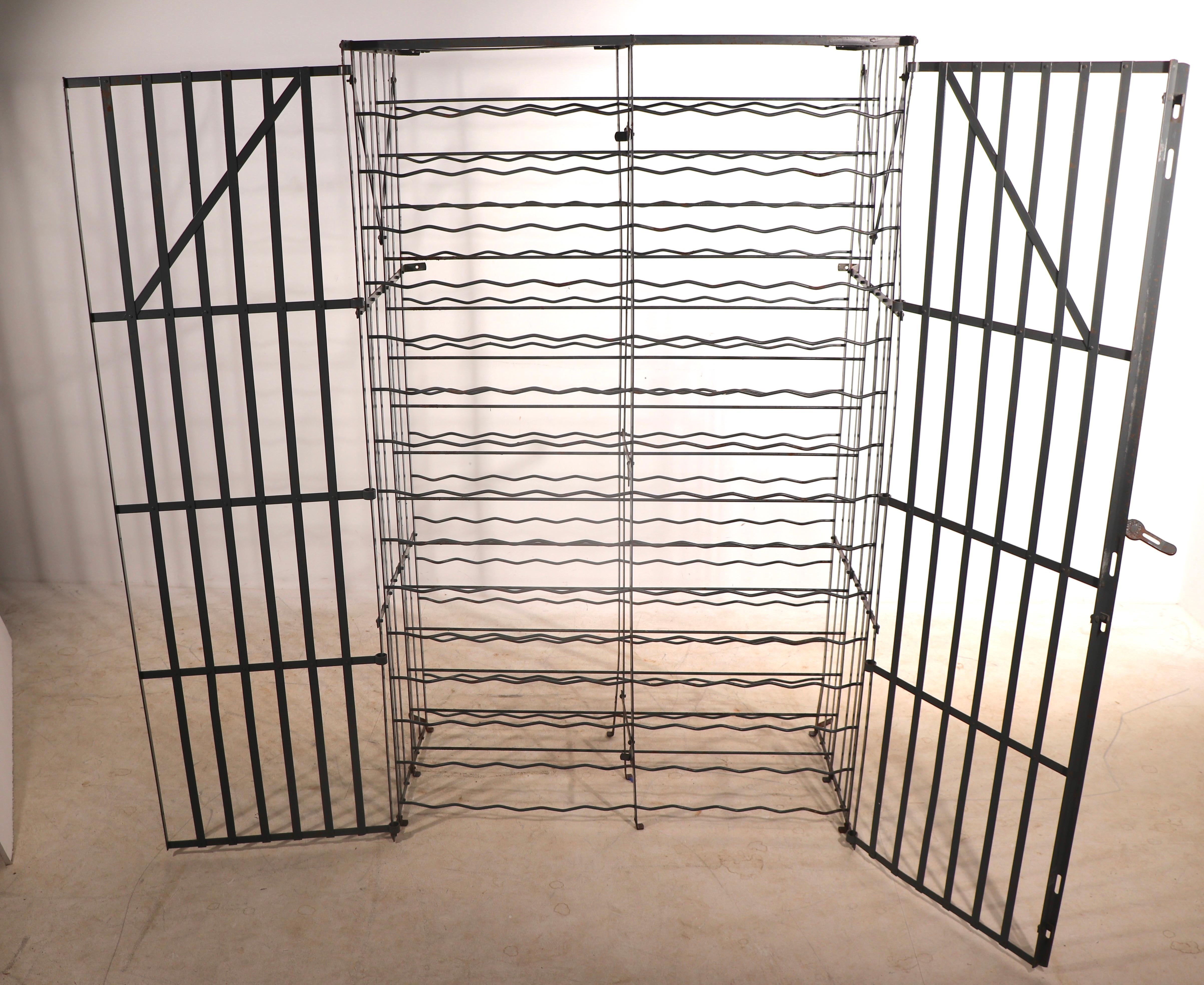 Spectacular double door steel cage wine rack,  Made in France by Rigidex. This example holds up to 300 bottles, making it suitable for both commercial and serious wine enthusiasts. The cage structure can free stand, or be attached to a wall for