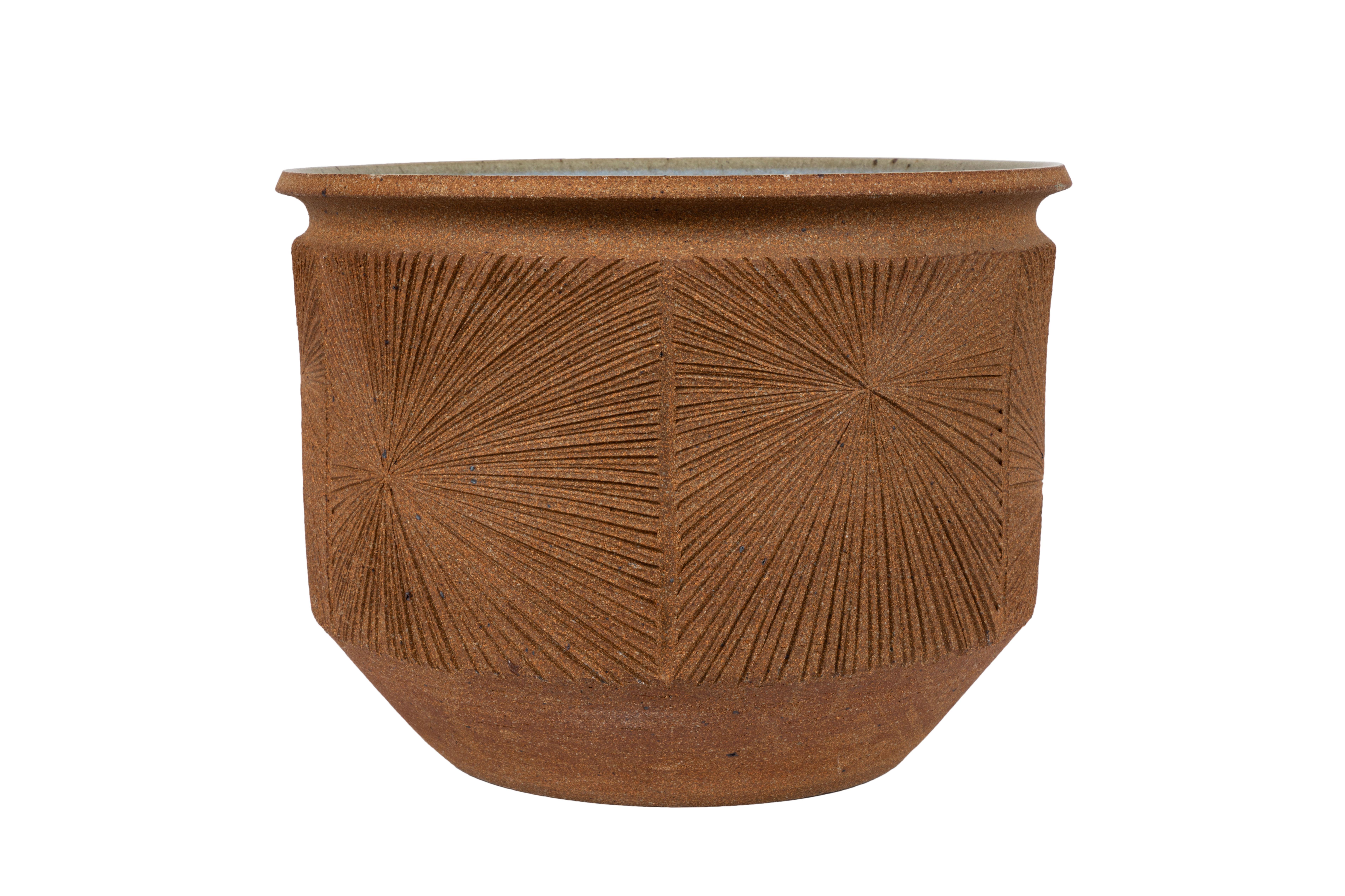 Large Robert Maxwell & David Cressey Sunburst planter for Earthgender. Studio executed in hand etched textured earthenware with a stunning interior colored glaze. A very clean example of an increasingly rare and collectible design collective that
