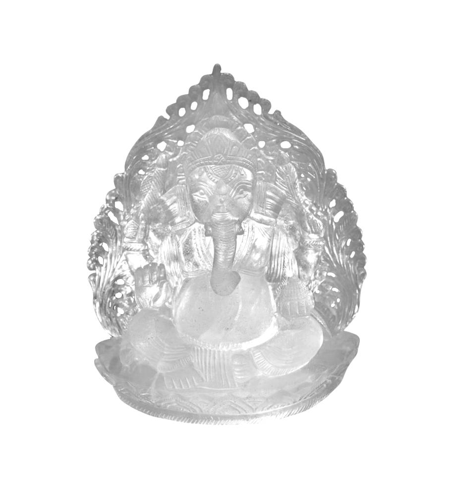 An extraordinary 8.5 lb solid rock crystal quartz sculpture of Ganesha. Seated on a lotus throne and backed by a radiate mandorla, Ganesh holds a bowl of sweets in his front left hand, symbolizing abundance and generosity. His right hand is poised