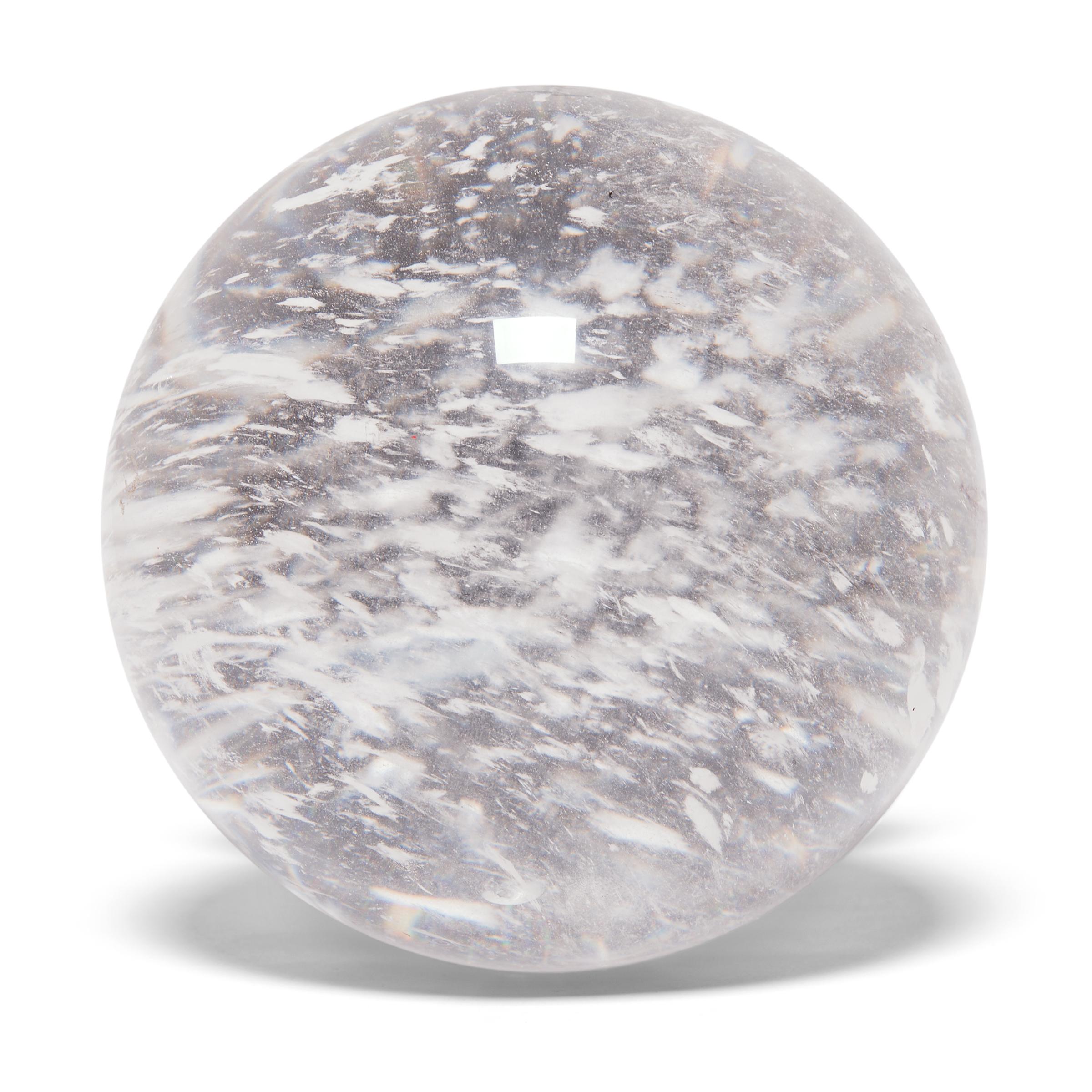 Gem lore is endless, and every culture has its own beliefs about specific stones tied to cultural history, geography, and spiritual practices. In China, some practitioners of feng shui value clear quartz, like this beautiful crystal ball, for its