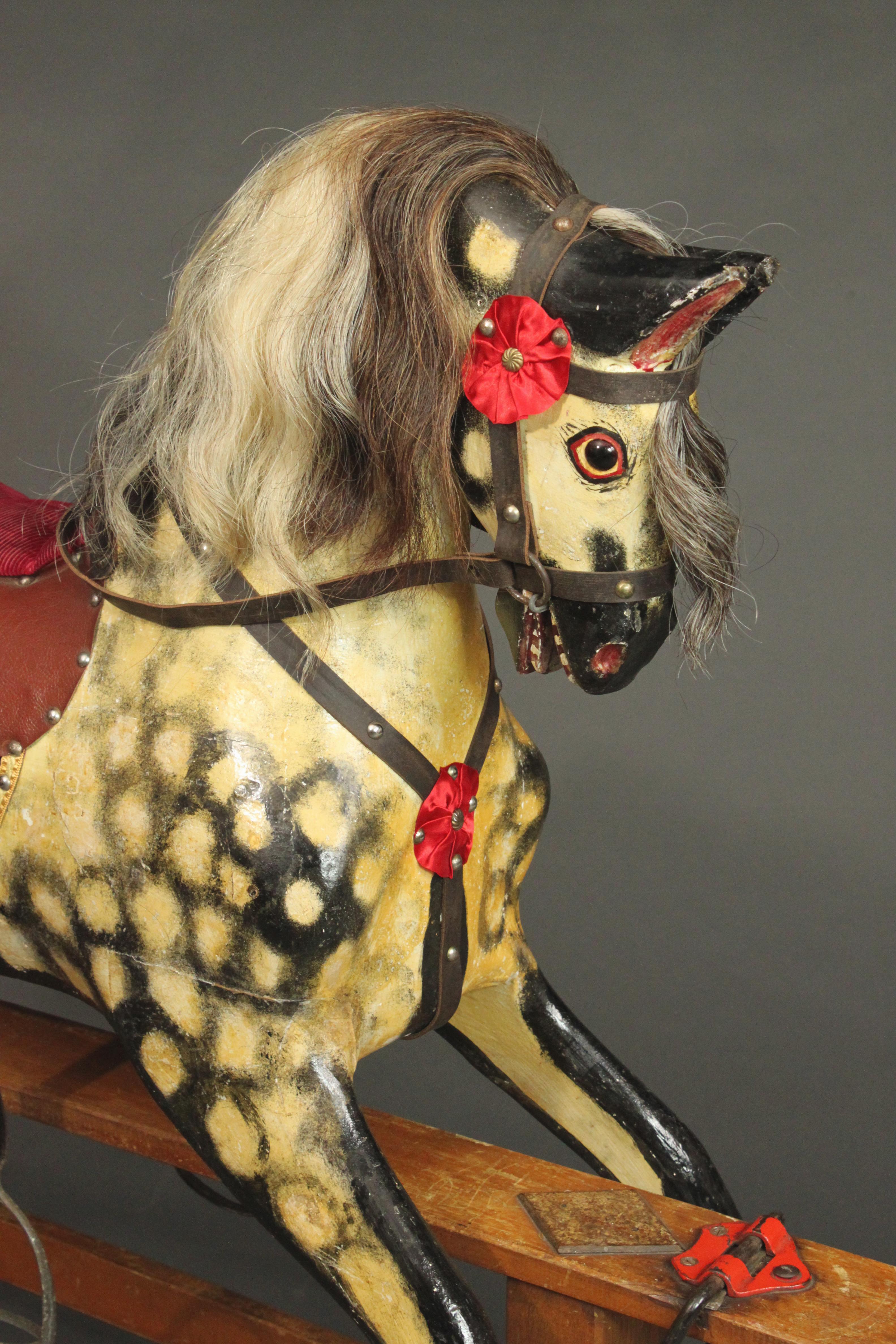 A large antique rocking horse made by Collinson in circa 1950. Collinson has been making rocking horses since 1835, but most of the ones that have survived date from the post-war period.
The paintwork is original and has had minor resoration, the