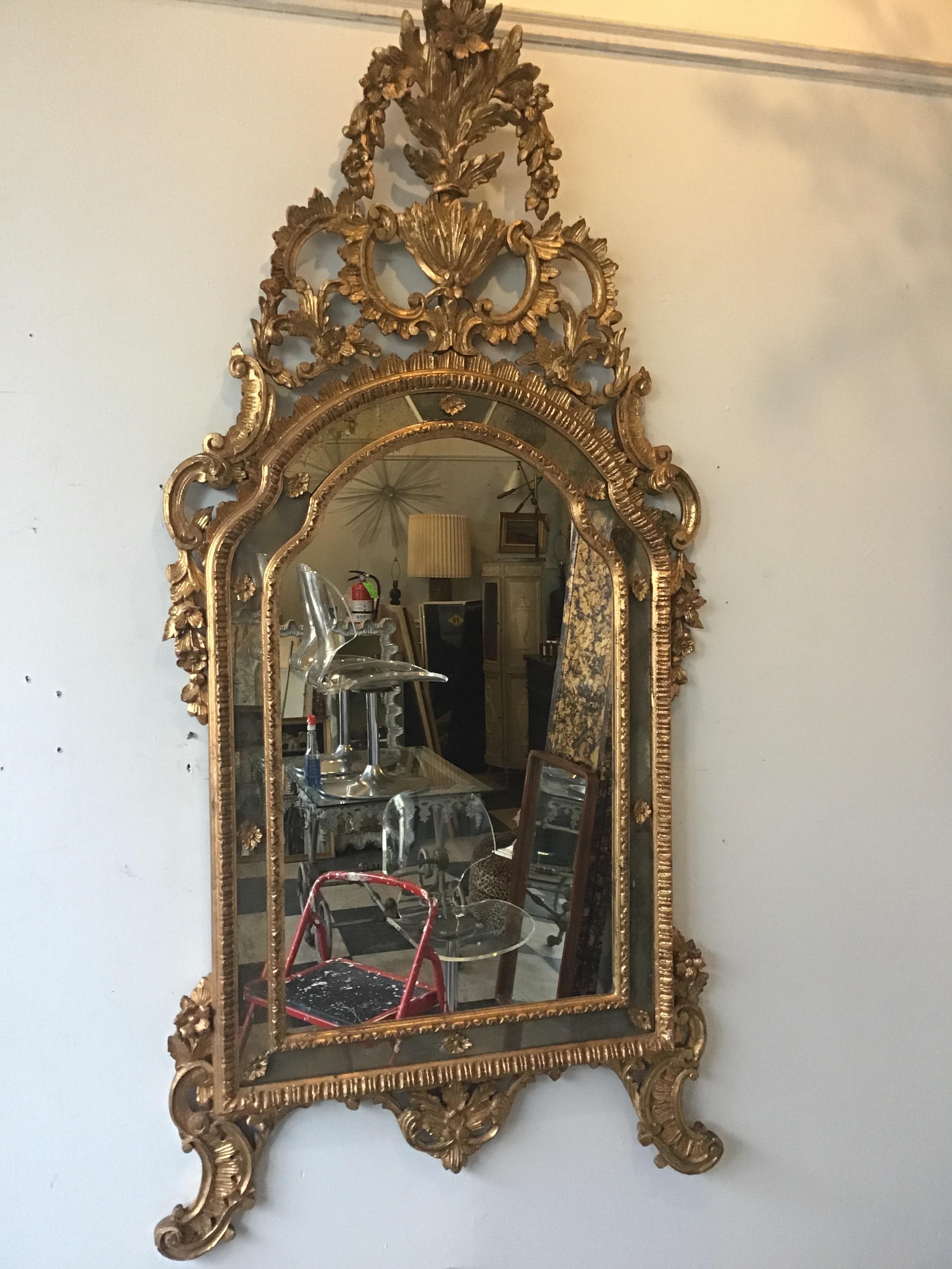 Mid-20th Century Large Rococo Style Italian Carved Wood Gilt Mirror For Sale