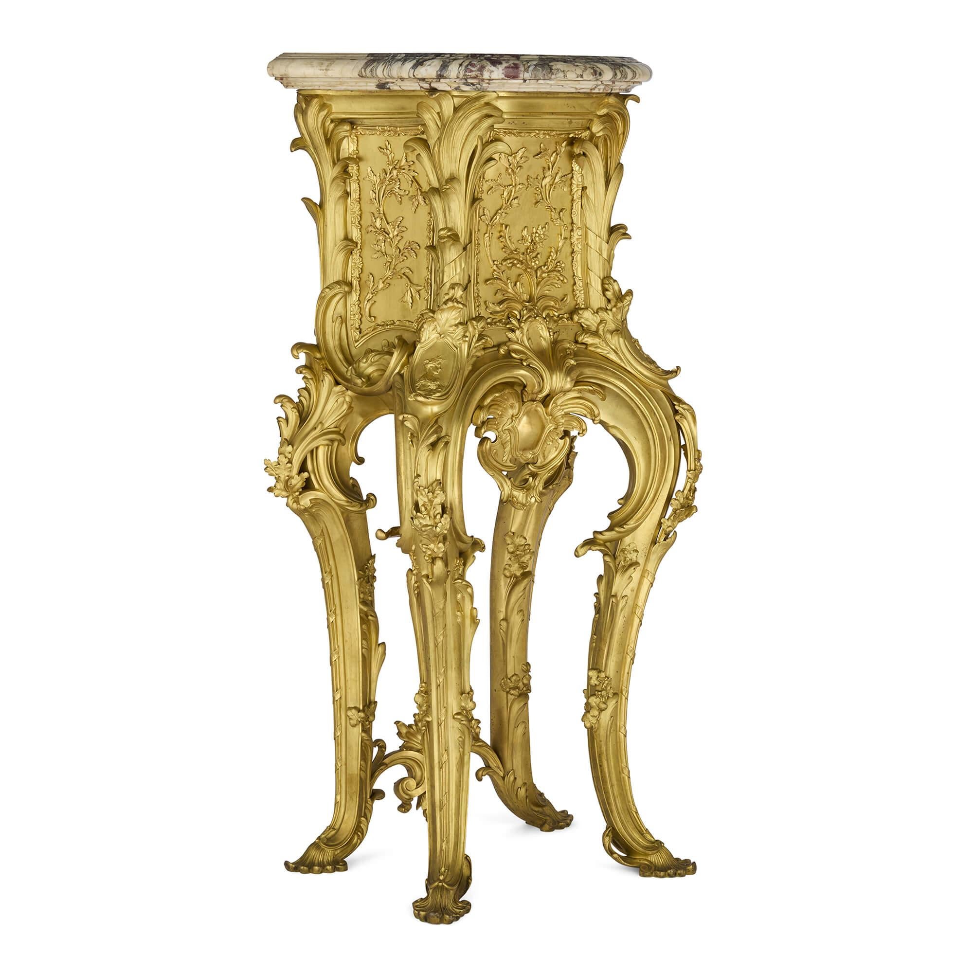 Large Rococo style ormolu and marble pedestal after Caffieri
French, Late 19th Century
Height 136cm, width 65cm, depth 41cm 

This exquisite antique pedestal is inspired by the designs of Jacques Caffieri (1732–1806), a famous French sculptor