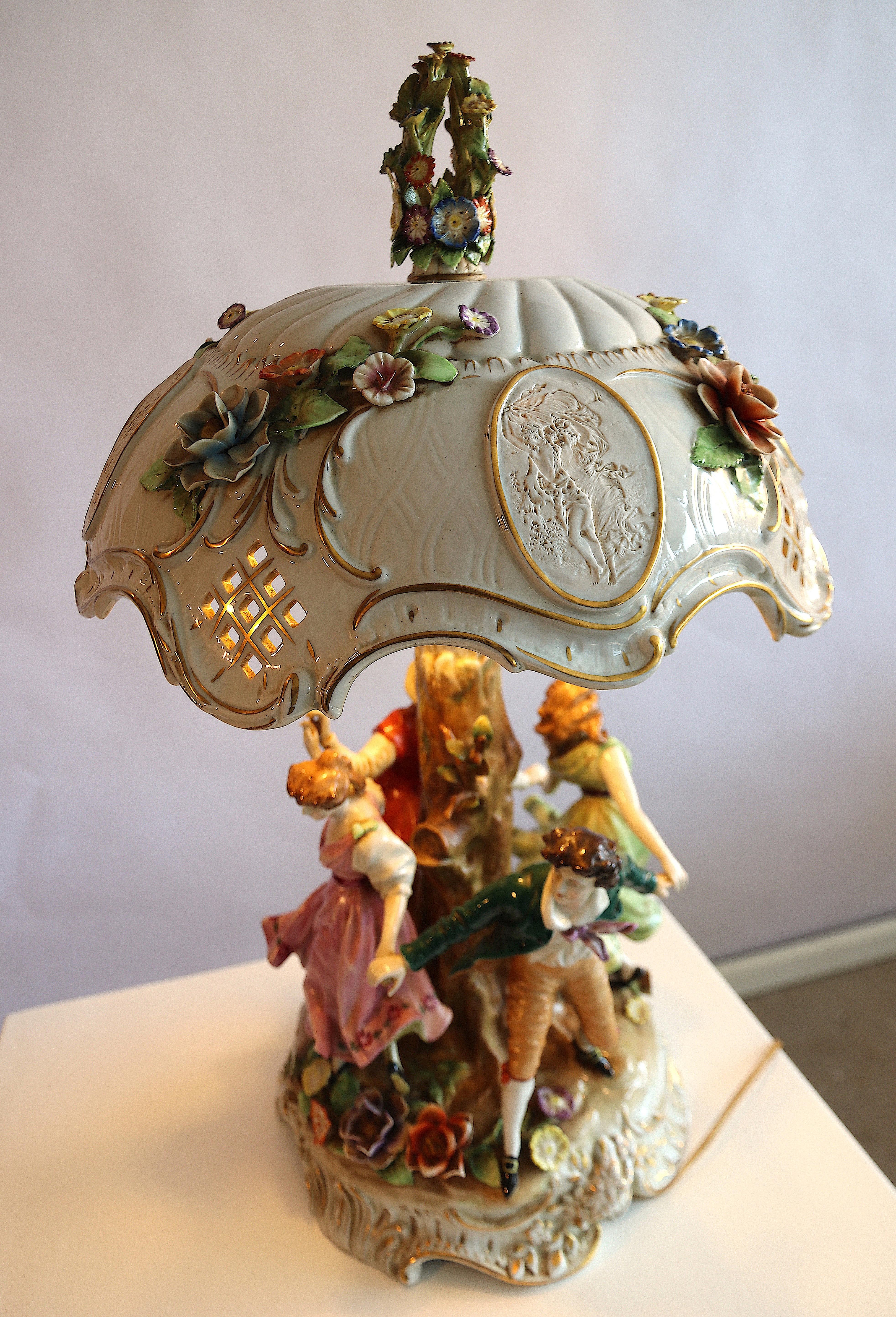 Absolutely amazing large table lamp signed with the crowned N for the royal Italian Capodimonte manufacturer of porcelain in Naples since the 18th century. The mark with which this lamp is stamped, is used until, circa 1830. 

