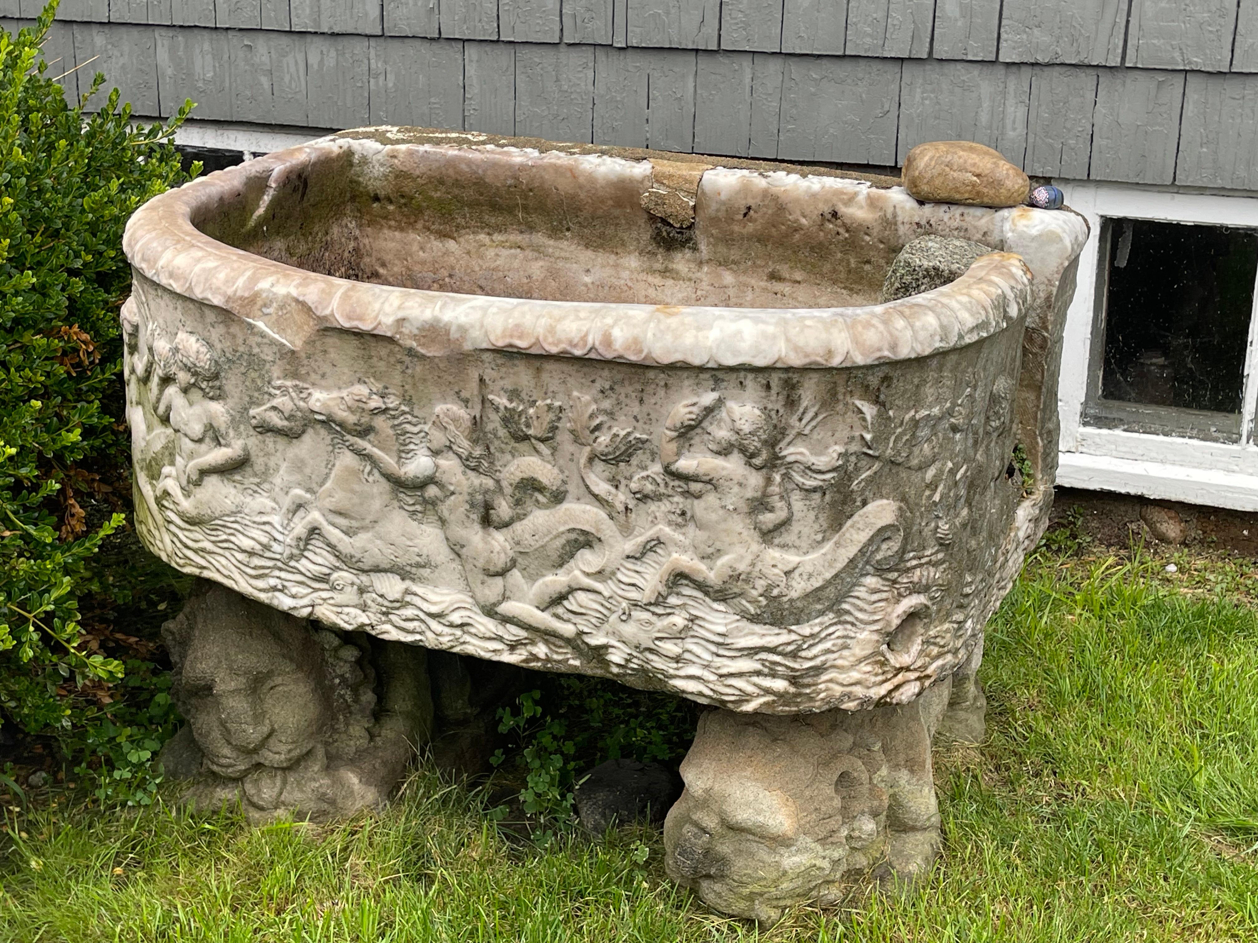 Large Carved Roman Marble Cistern from Carcassonne Castle in Marblehead, MA.  Carved Classical Scene of Sea Centaurs, Hippocamps and Water Gods and Goddesses.
An open mouthed dolphin once allowed water to escape from one side.  

Carcassonne Castle
