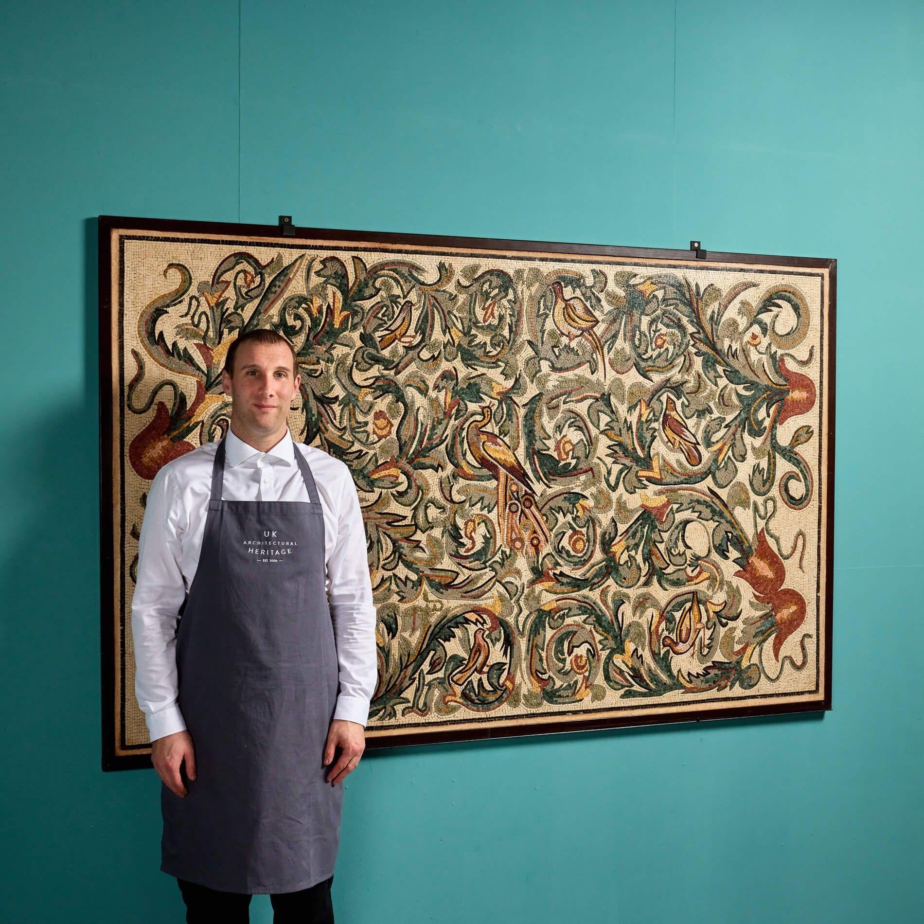 The large scale and size of this intricate mosaic wall panel is an impressive artwork piece for any interior. It is beautifully made in Roman style, small tessera mosaic tiles used to depict intricate birds among scrolling green acanthus leaves and