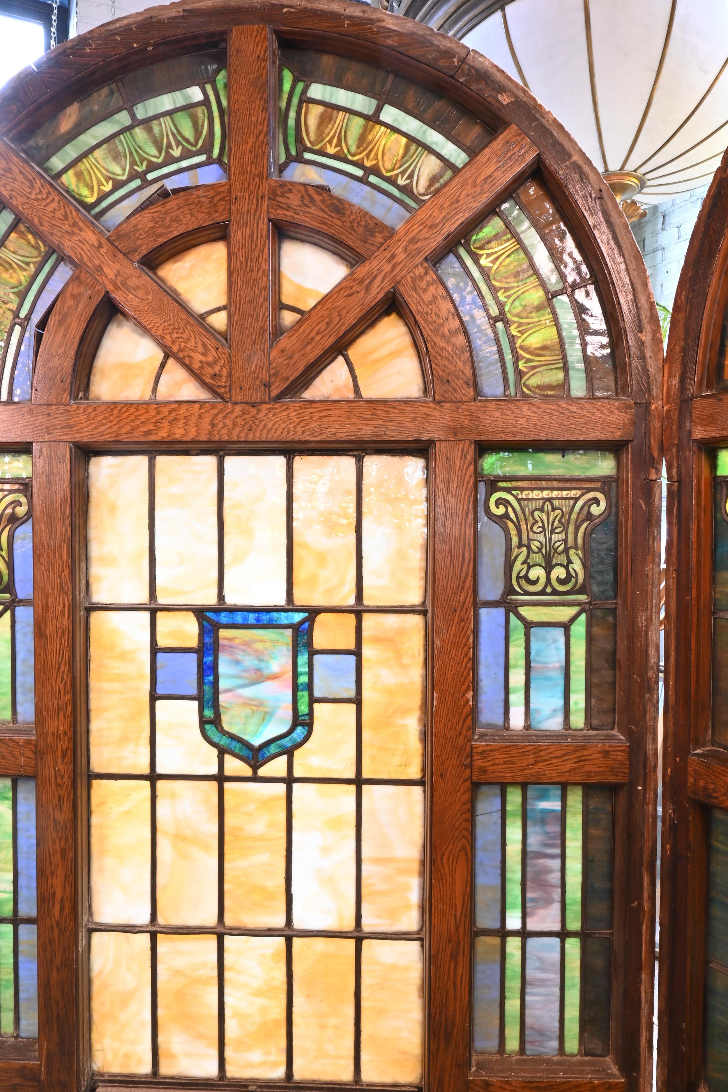 a square stained glass window is divided