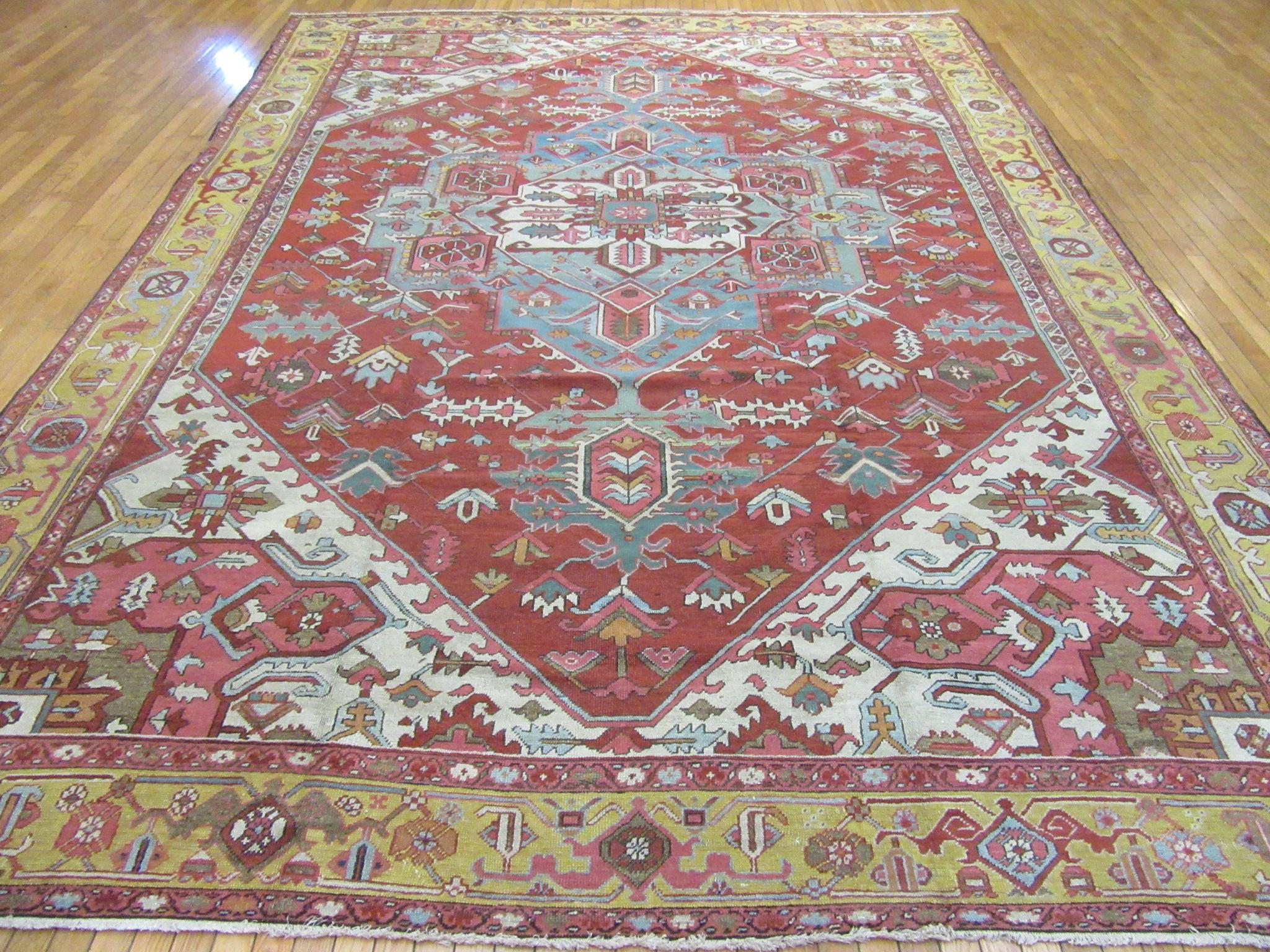 Hand-Knotted Large Room Size Antique Hand Knotted wool Red Teal and Gold Persian Serapi Rug For Sale