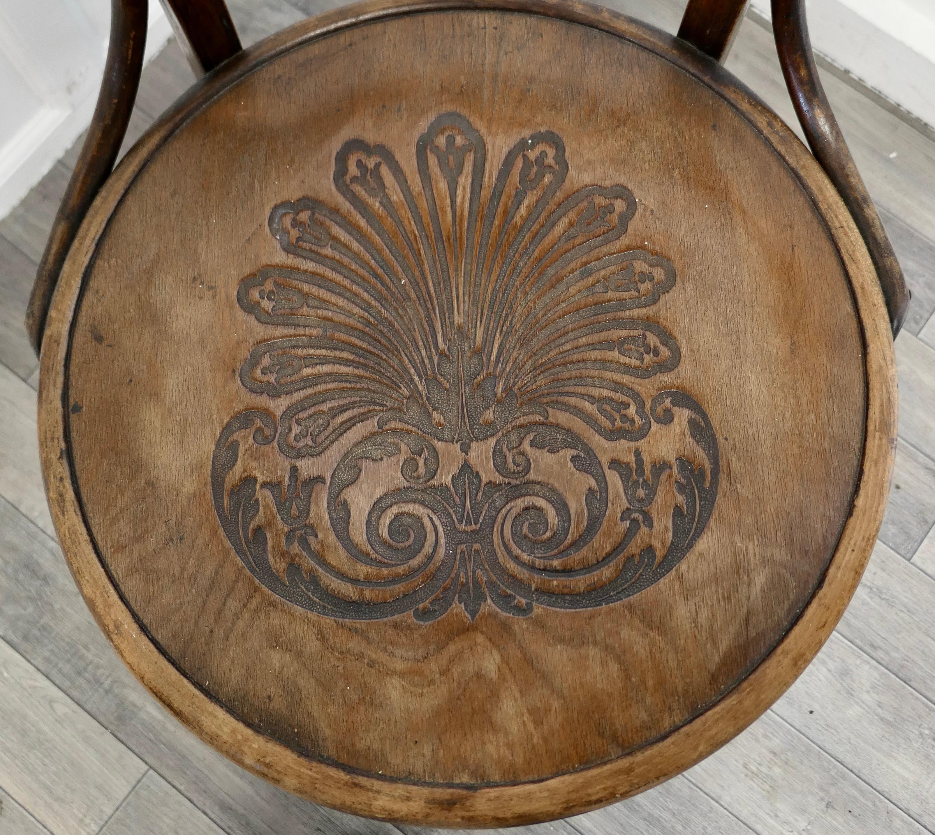 Large Roomy Bentwood Carver Chair

This is a rare and charming piece the carver chair is made in bentwood with a large pressed ply wood seat, the design is a classic for the beginning of the 20th century and timeless 
 The seat is in excellent