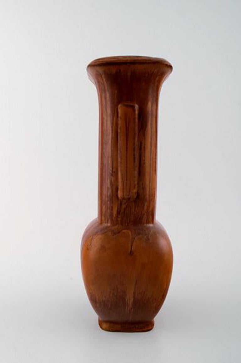 Large Rörstrand/Rorstrand stoneware vase by Gunnar Nylund.
Measures: 28 cm x 14 cm.
In perfect condition.
Beautiful glaze in brown shades.
1st. assortment.
Stamped.
