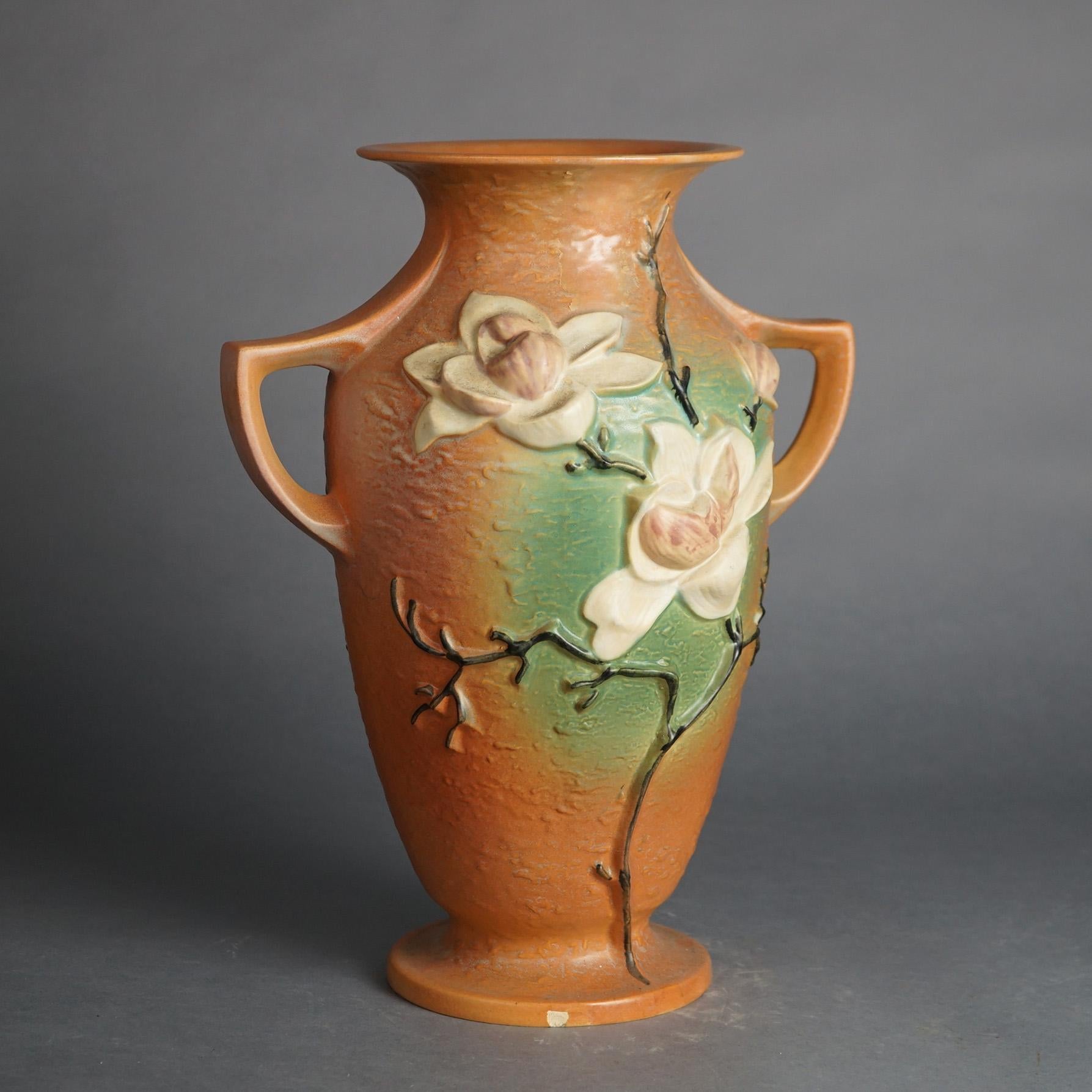 Large Roseville Art Pottery Double Handled Brown Magnolia Vase C1940

Measures- 16.75''H x 12''W x 8.5''D