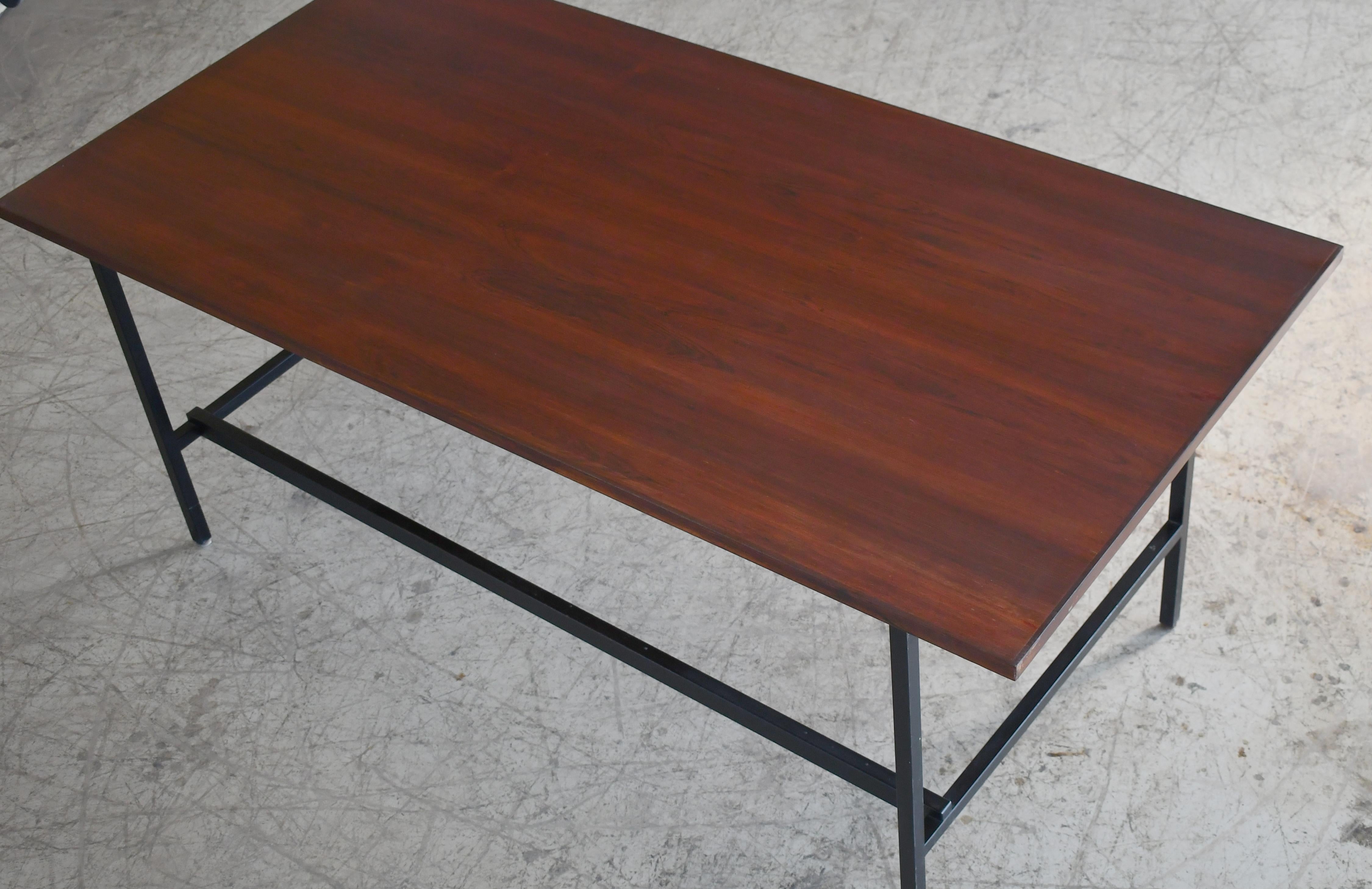 Beautiful large Danish modern executive desk with metal base made probably around the late 1960's in Denmark. Unmarked and we are not sure of the Designer nor Maker. Great large working space providing a large work surface to spread out and get