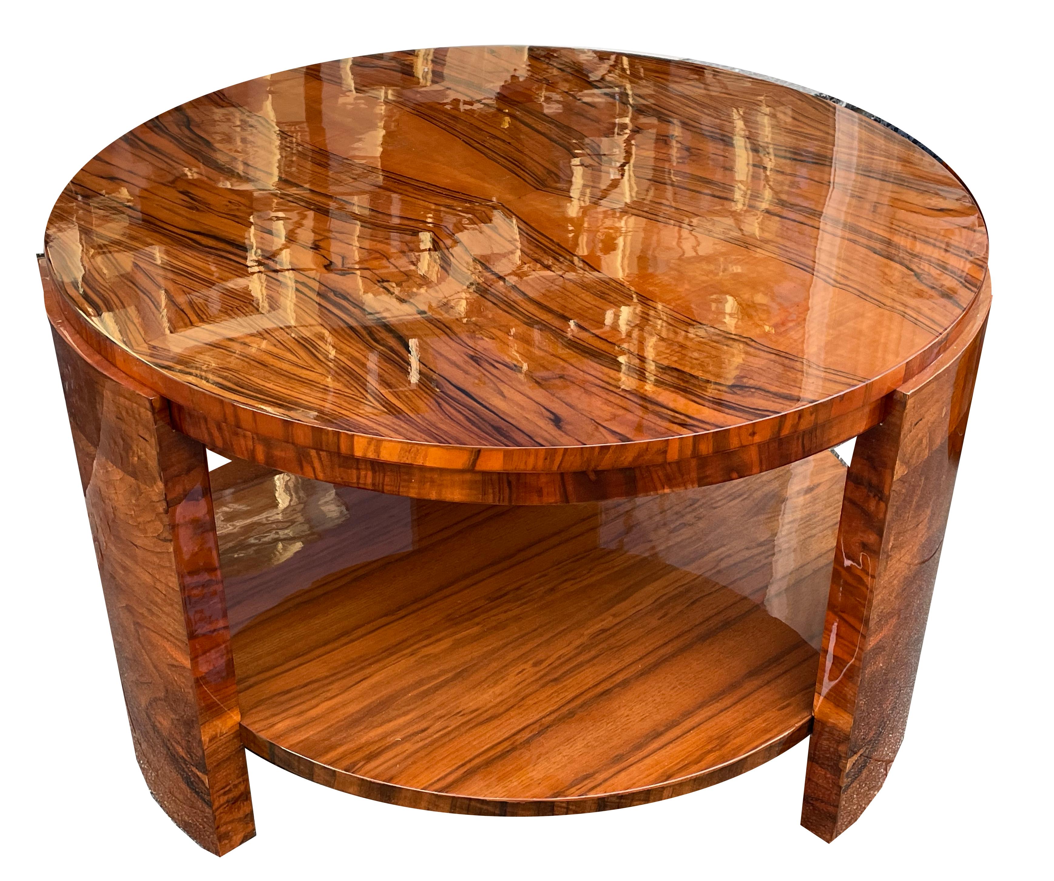 Large Round Art Deco Coffee Table
This round Art Deco coffee table makes a particularly striking impression in clean, architecturally structured rooms with expansive windows.

In a Bauhaus-style living room with white walls and a dark floor, its