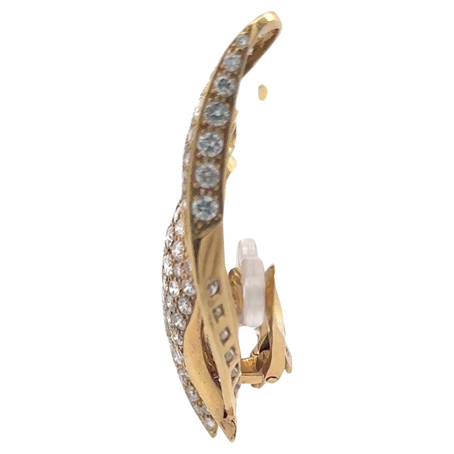 18 Karat yellow gold earring climbers featuring 192 Round Brilliants weighing 13.25 carats and 40 Baguette diamonds weighing 3.25 carats. 
Beautiful Bold Earrings. 