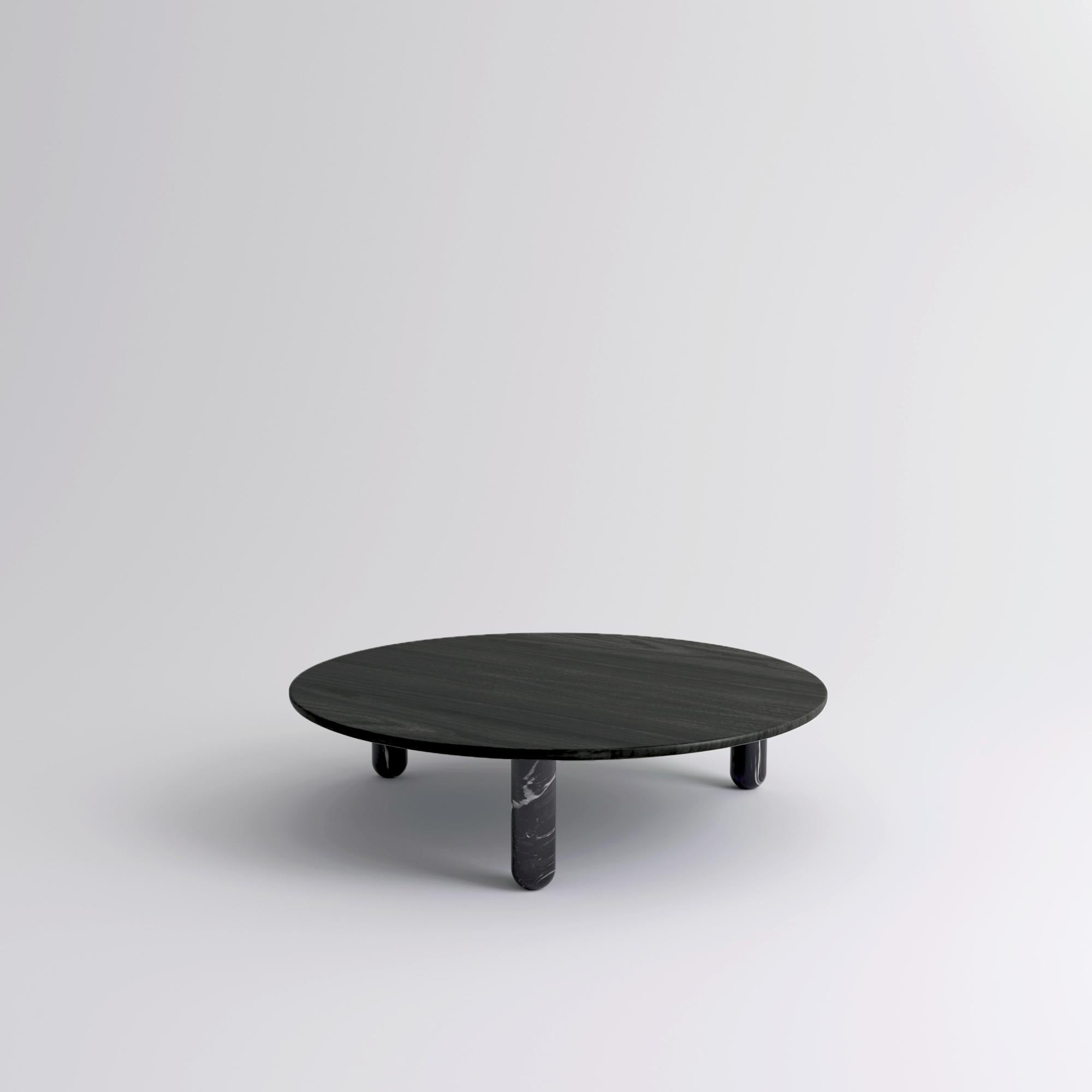 Grande table basse ronde en marbre noir 